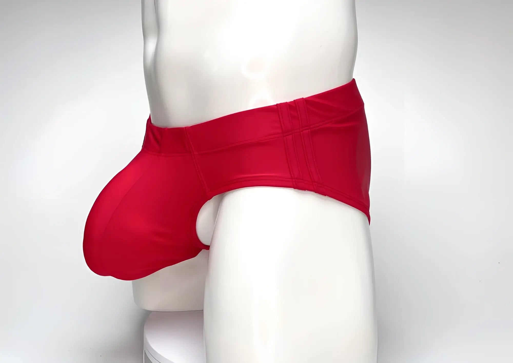 Wildmant big boy pouch swim brief red in glossy smooth fabric with contoured design and form-fitting style