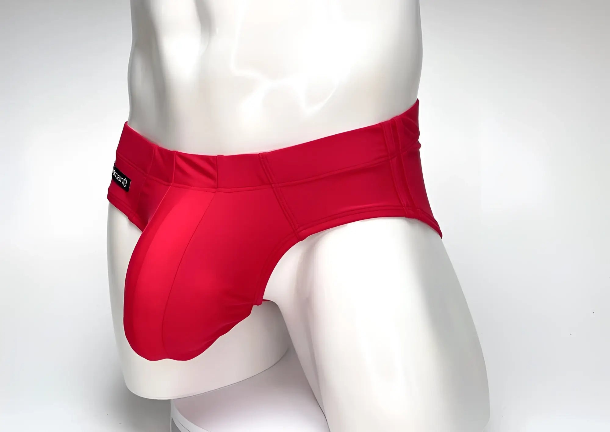 WildmanT big boy pouch swim brief in red with a snug fit and a small black brand tag on the waistband