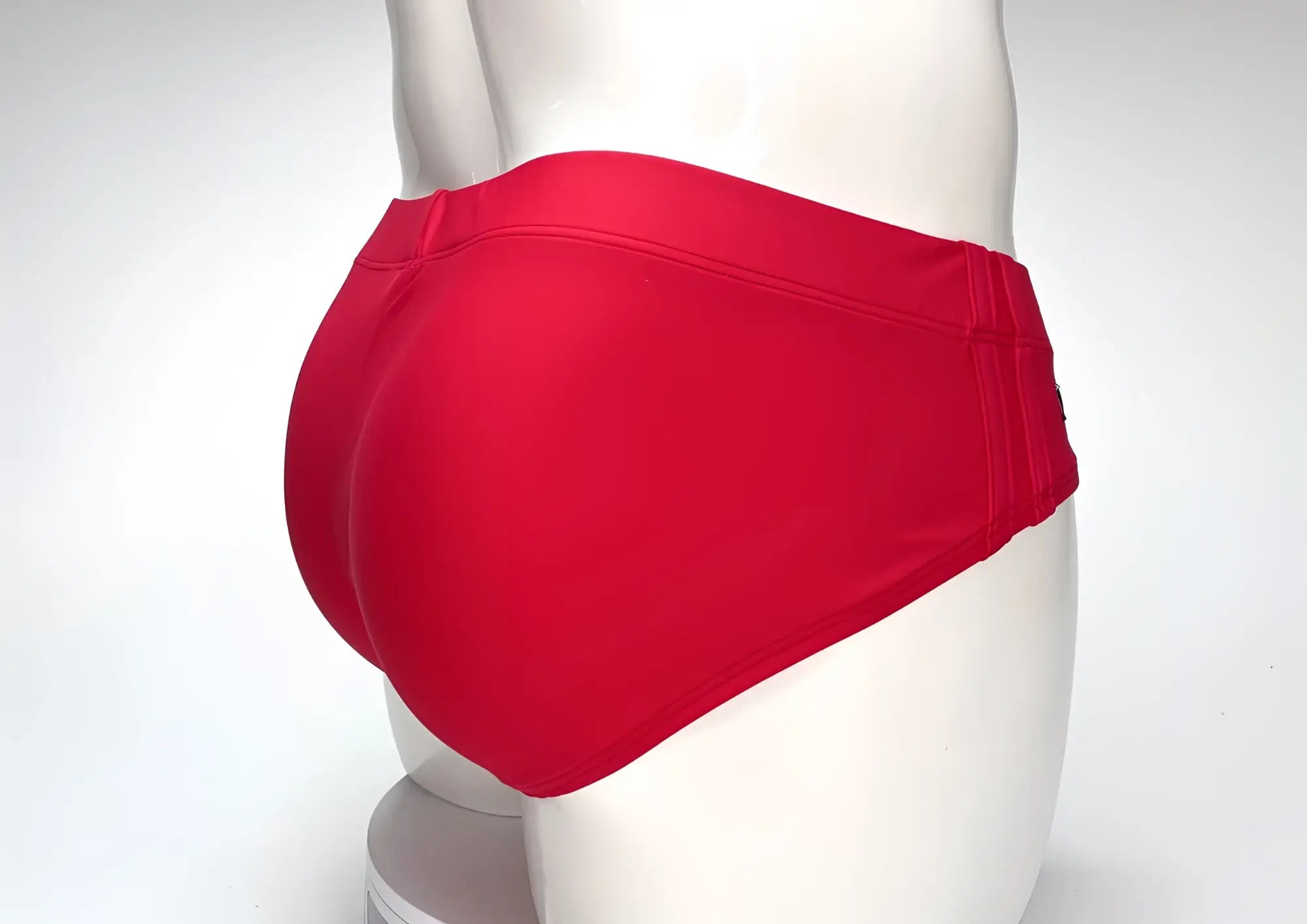 Wildmant big boy pouch swim brief in vibrant red with smooth stretchy fabric and tailored fit for swimming
