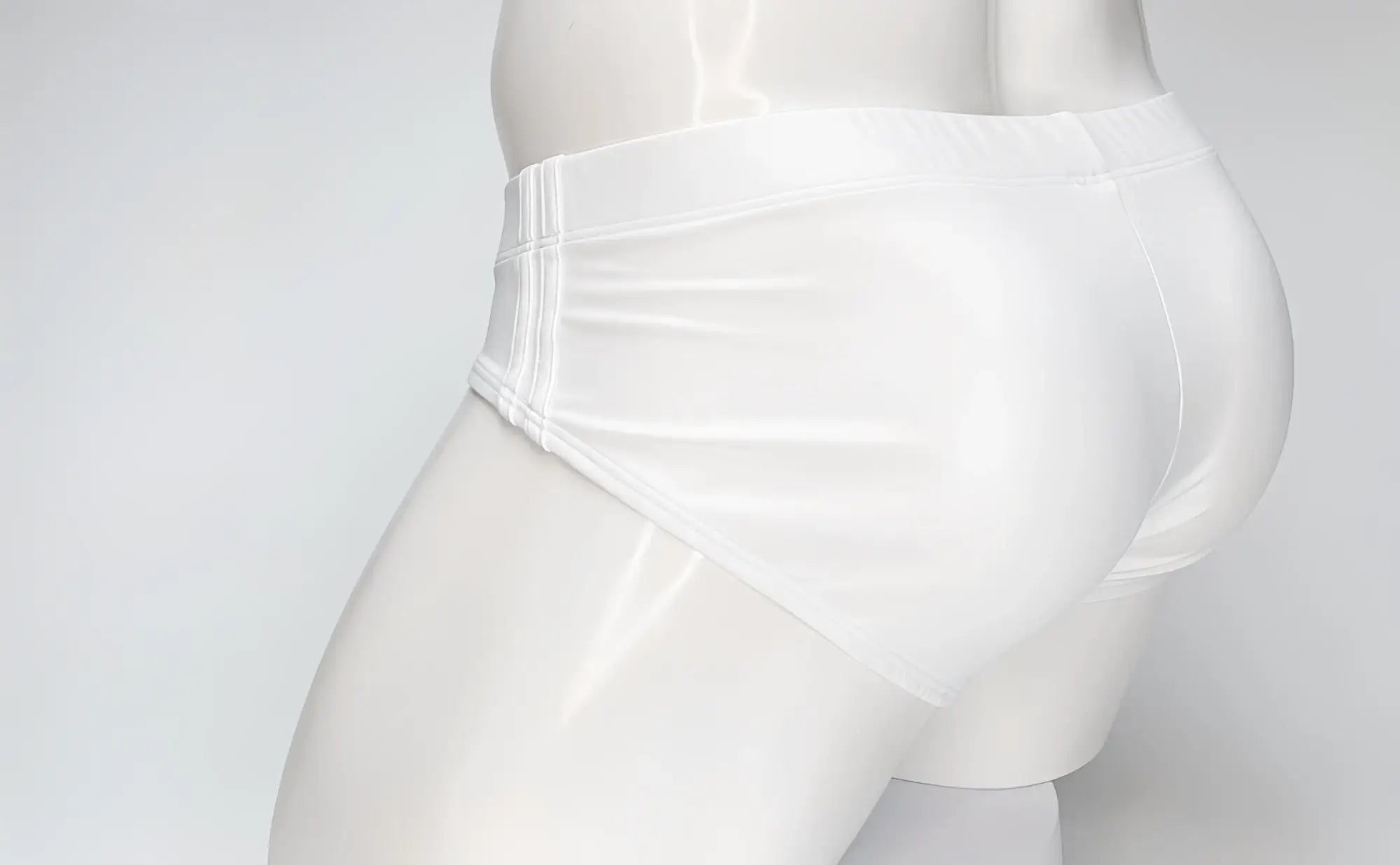 Wildmant big boy pouch swim brief in white glossy finish with tailored waistband and subtle vertical seam detailing