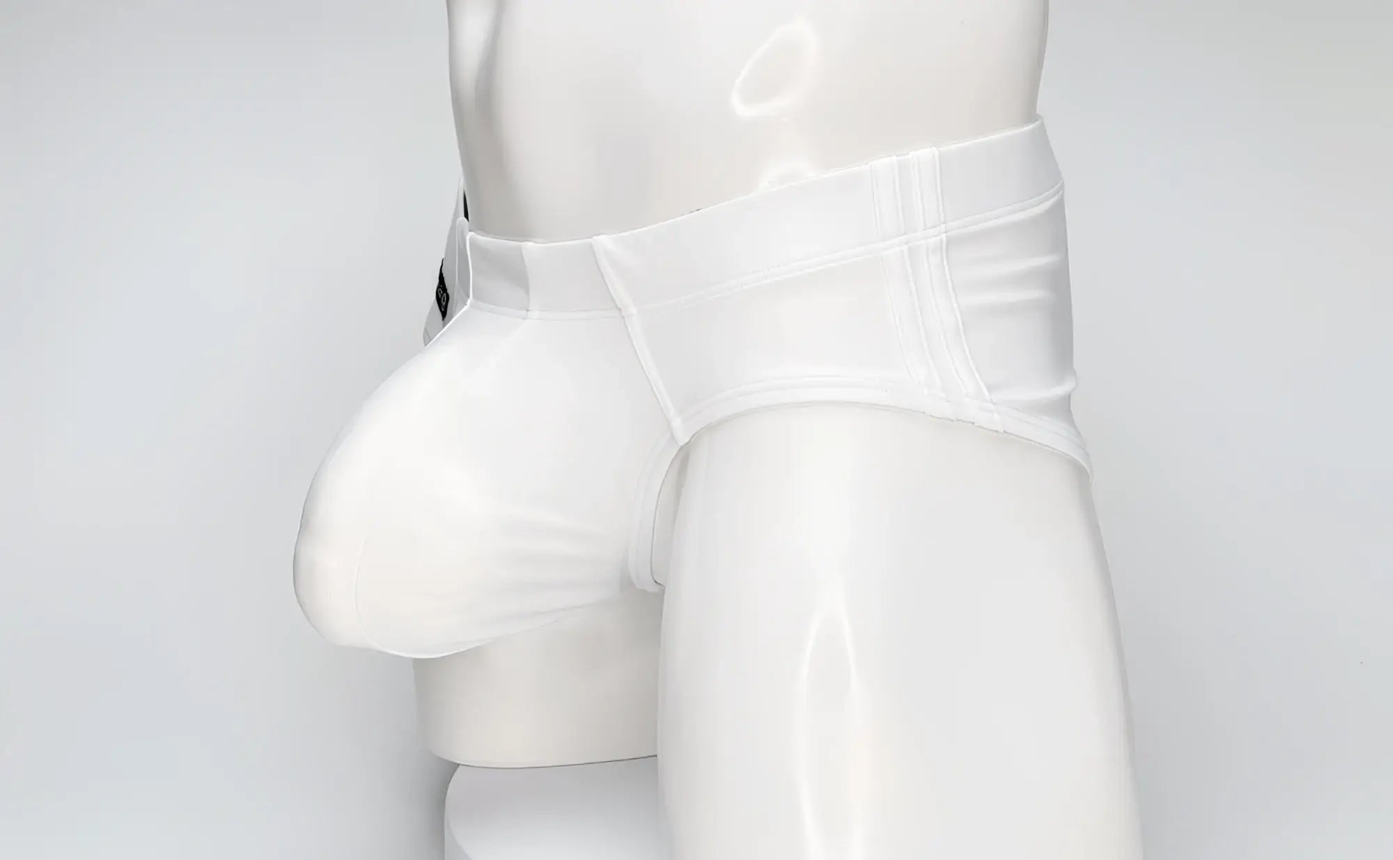 WildmanT big boy pouch swim brief white glossy latex with smooth form fitting design and reinforced waistband