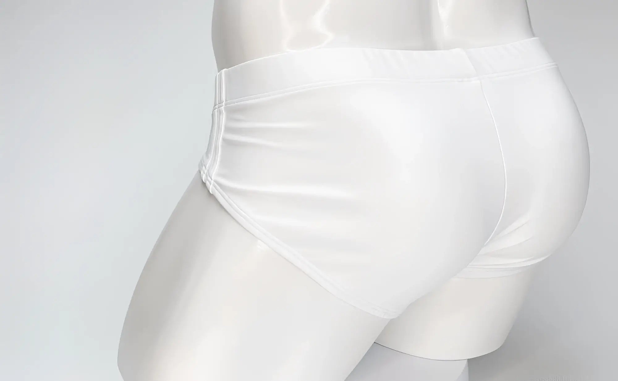 White glossy satin briefs with big boy pouch on mannequin wildmant swim brief for men