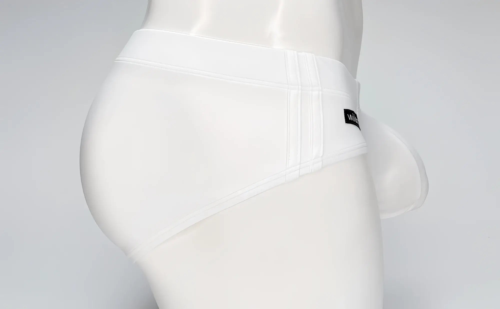 Wildmant big boy pouch white men’s swim briefs with sleek form-fitting design and subtle vertical side stitching