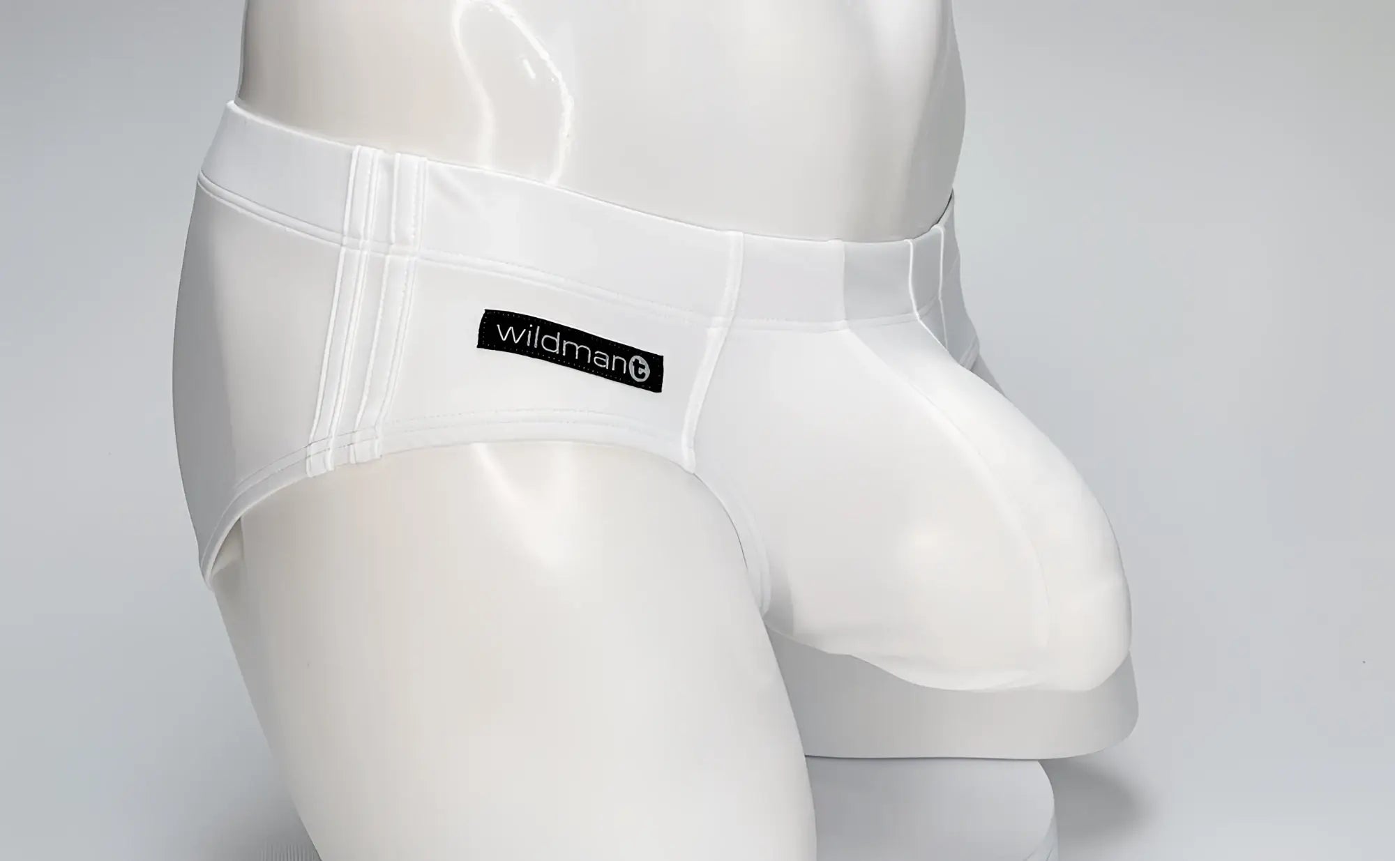 White wildman big boy pouch swim brief with sleek form-fitting design and subtle stitching details