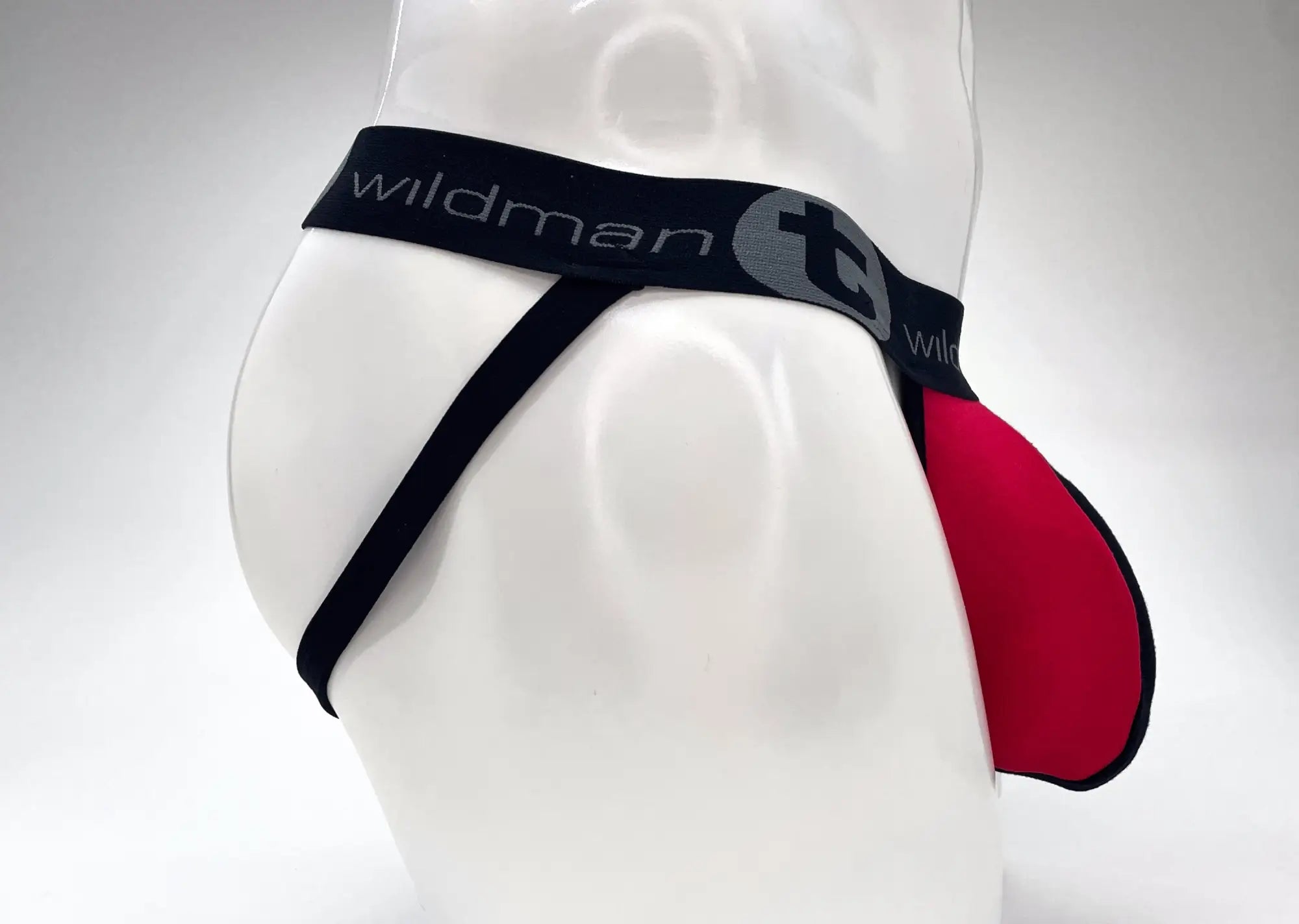 Wildman brand cotton big boy pouch stripe jockstrap in red and black with a sleek modern design