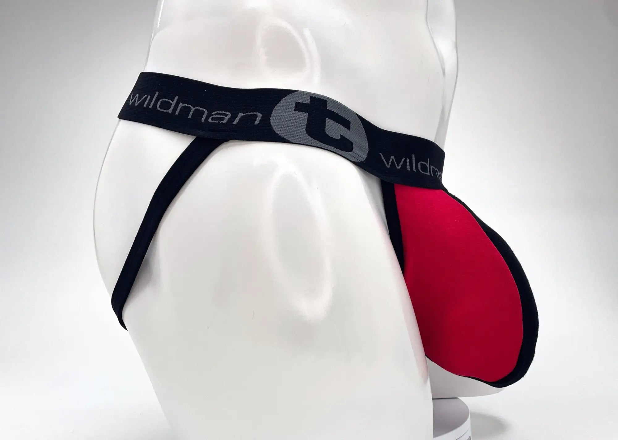 Wildmant cotton big boy pouch stripe jockstrap in red and black with a gray logo on the waistband