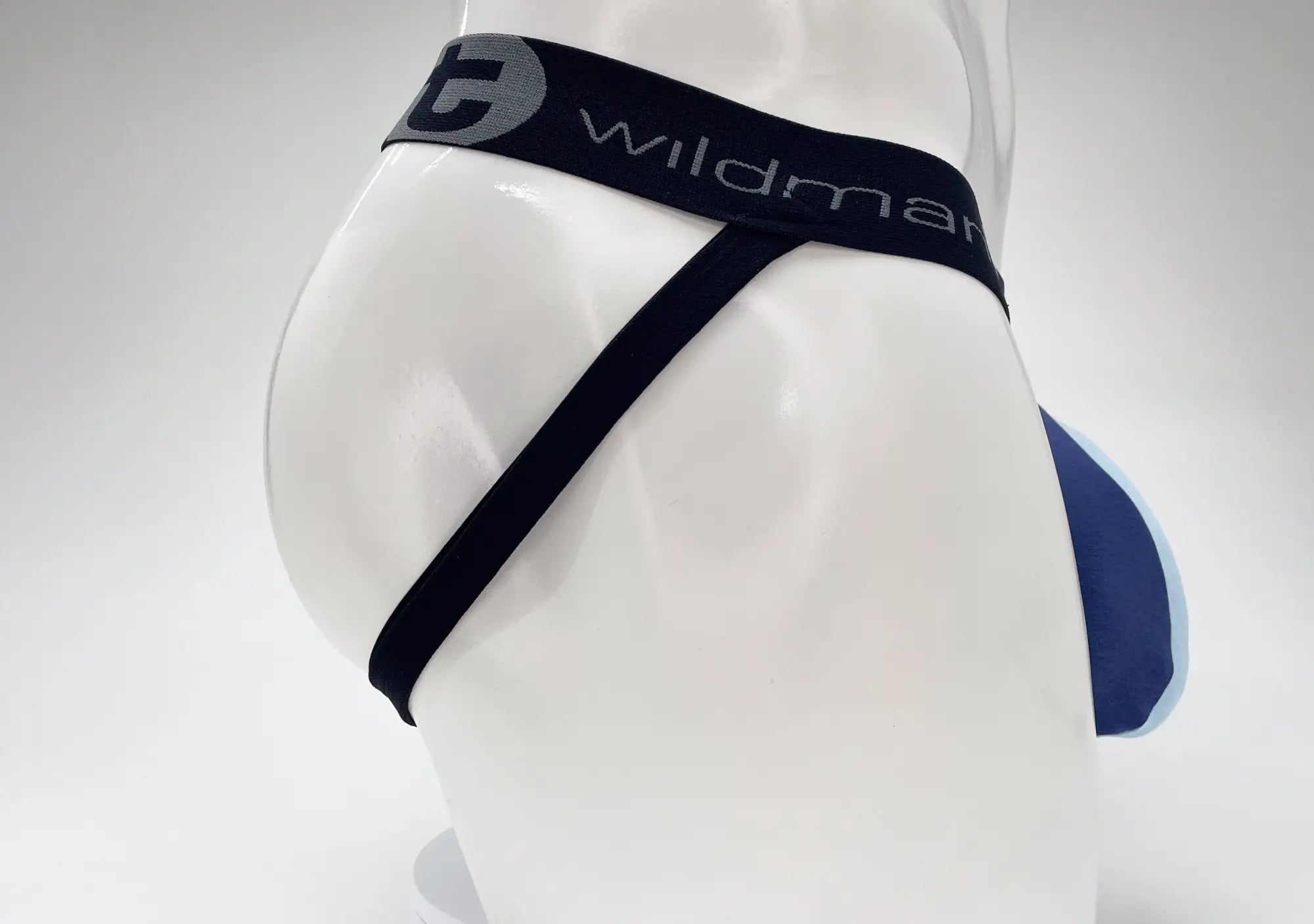 Black and navy blue Wildman brand cotton jockstrap with a sleek contoured design for comfortable support