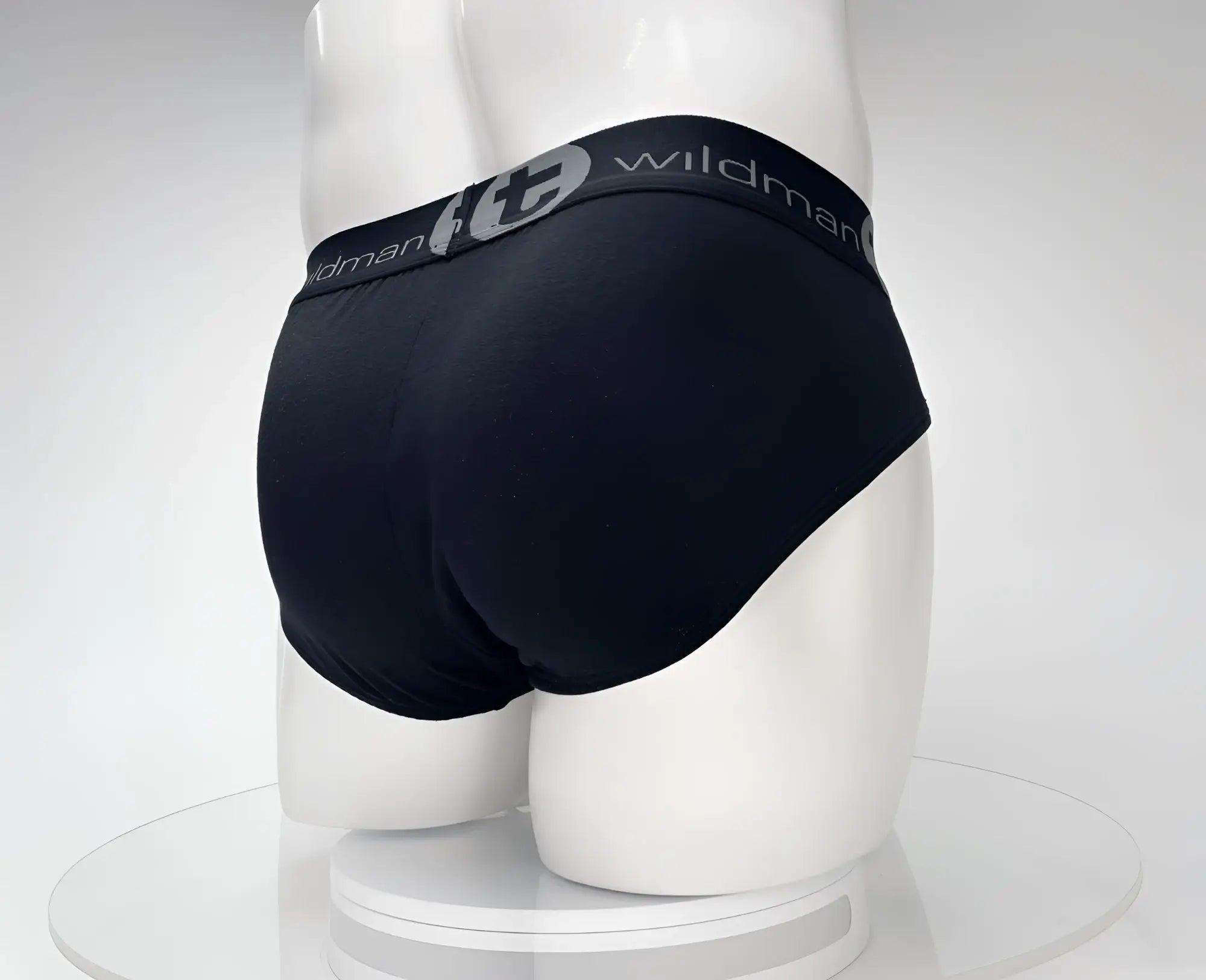Black wildman brand cotton briefs with gray elastic waistband featuring logo and text wildmant cotton monster cock brief