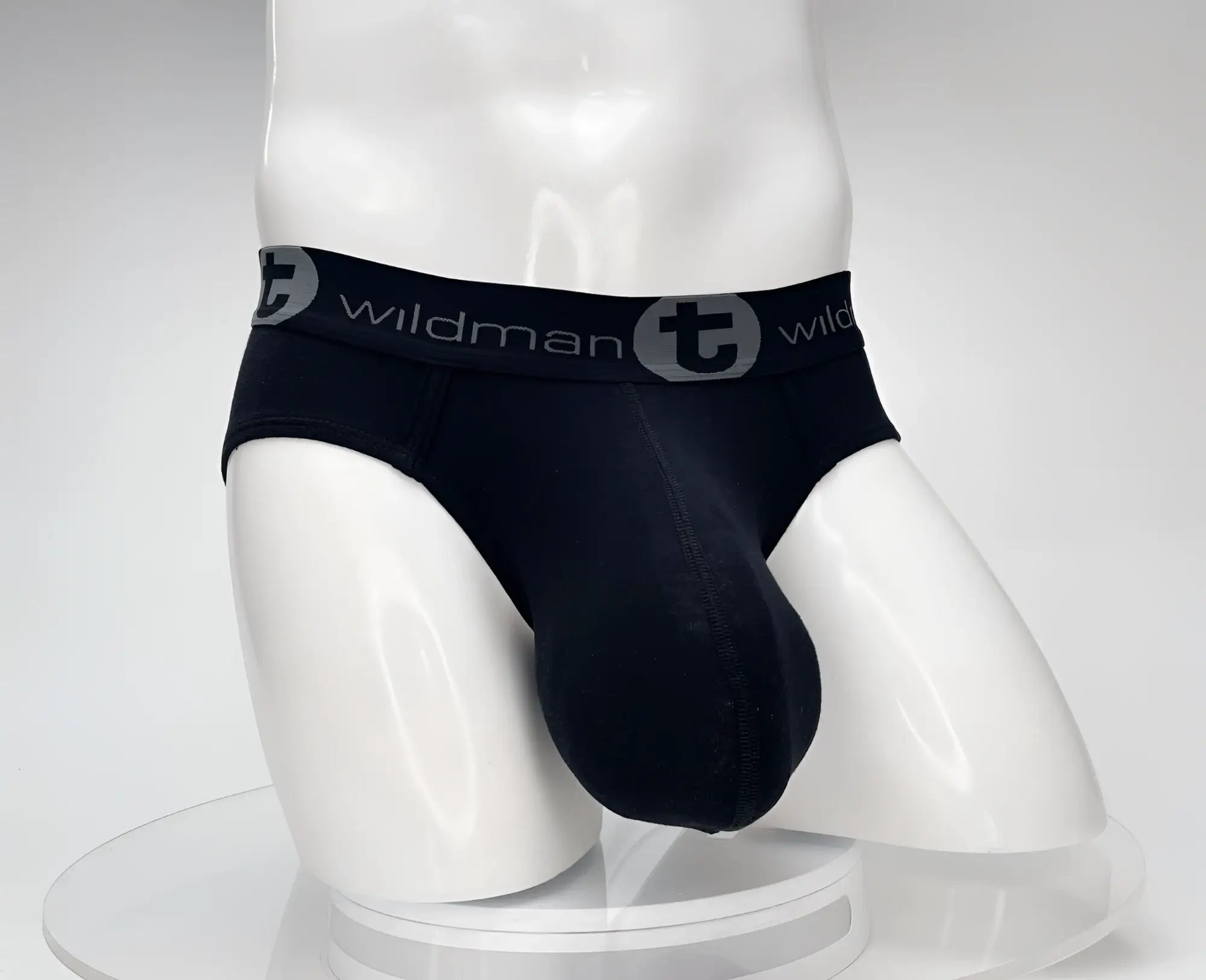 Black wildman cotton briefs with contoured support and elastic waistband featuring the wildman logo