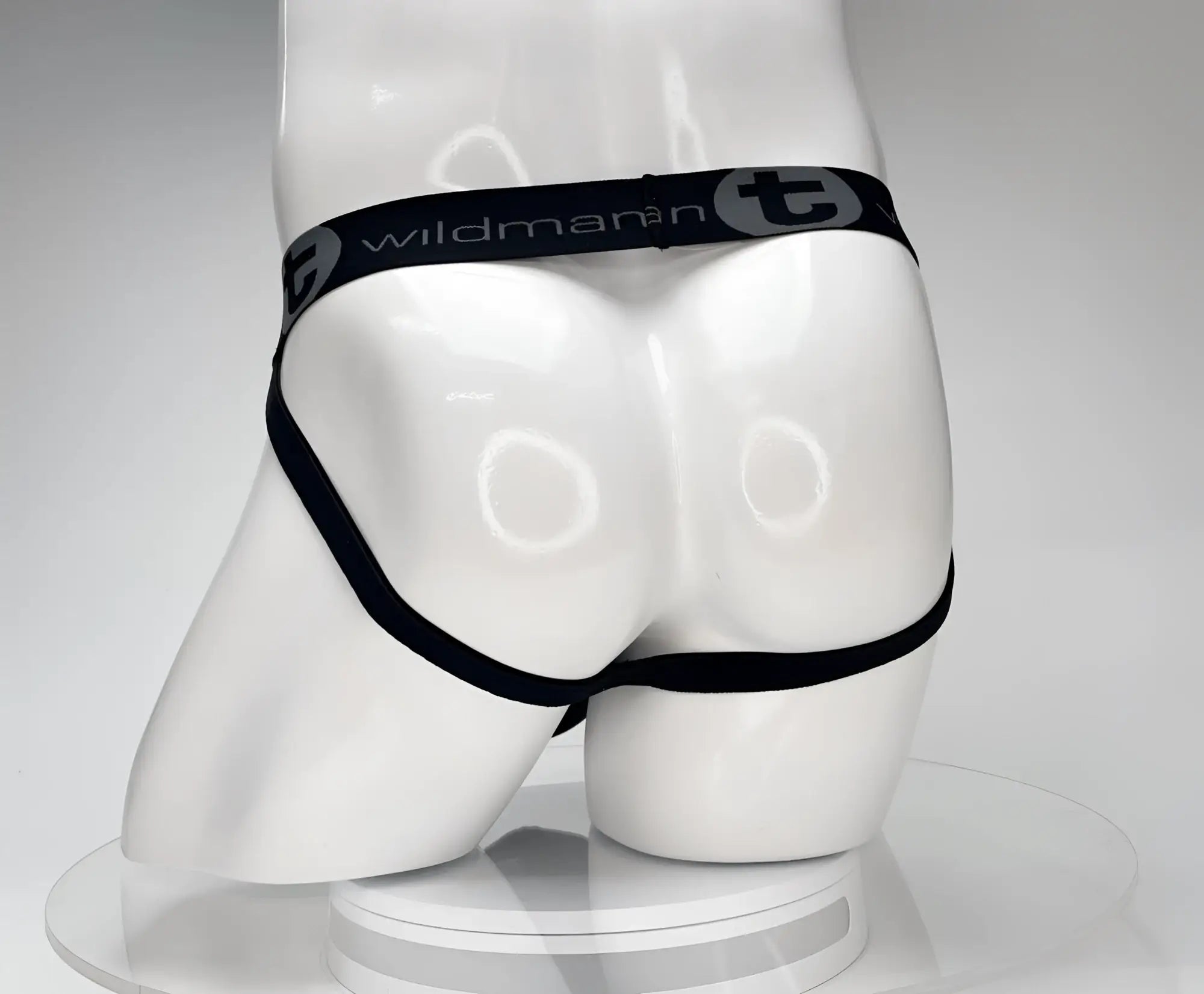 Black wildman elastic waistband on cotton monster cock jockstrap displayed on white mannequin front view