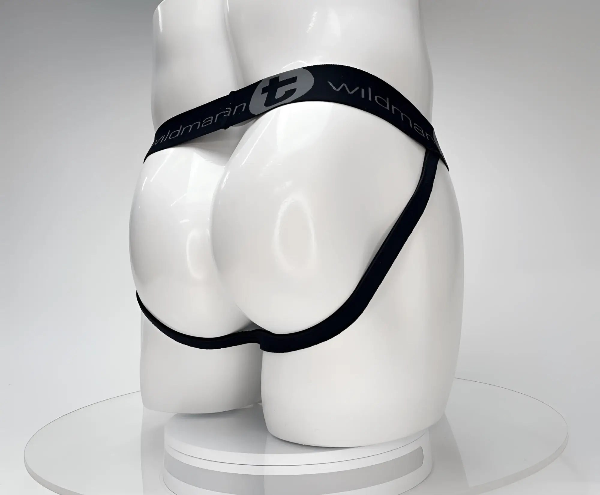 Black cotton wildmanT monster cock jockstrap with elastic waistband on white mannequin