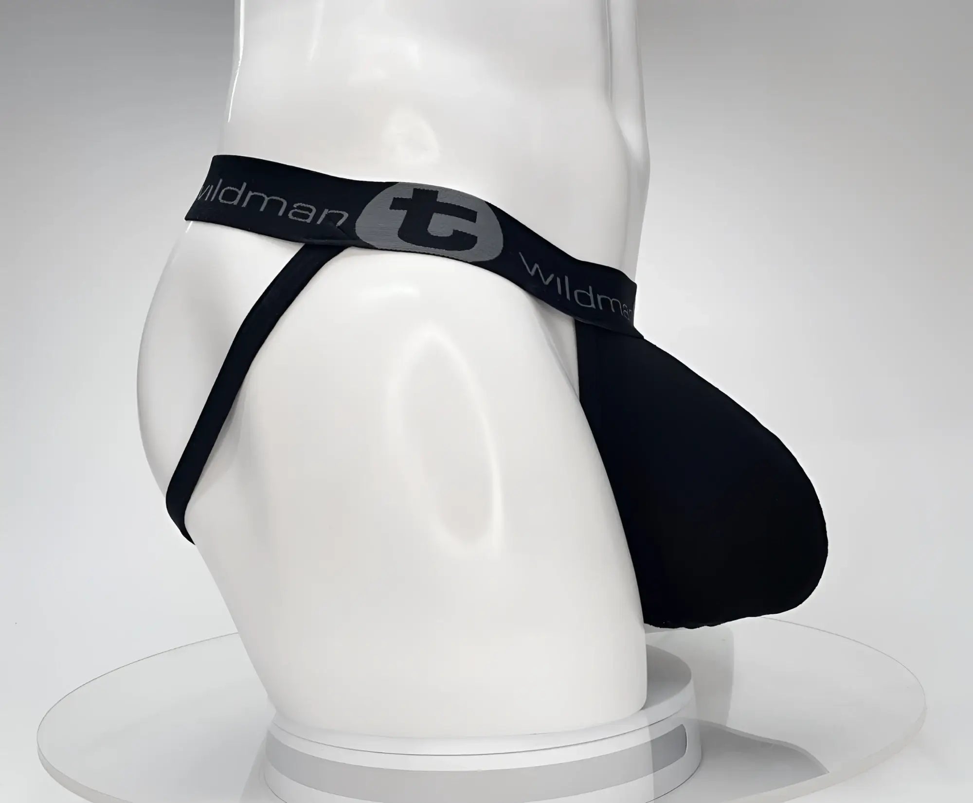 Black wildman brand cotton jockstrap with gray logo and elastic waistband from wildmant cotton monster cock collection