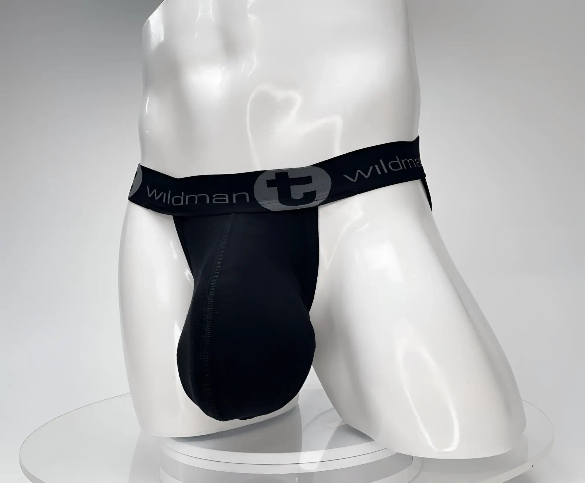 Black wildman cotton monster cock jockstrap with a sleek form-fitting design and elastic waistband in black