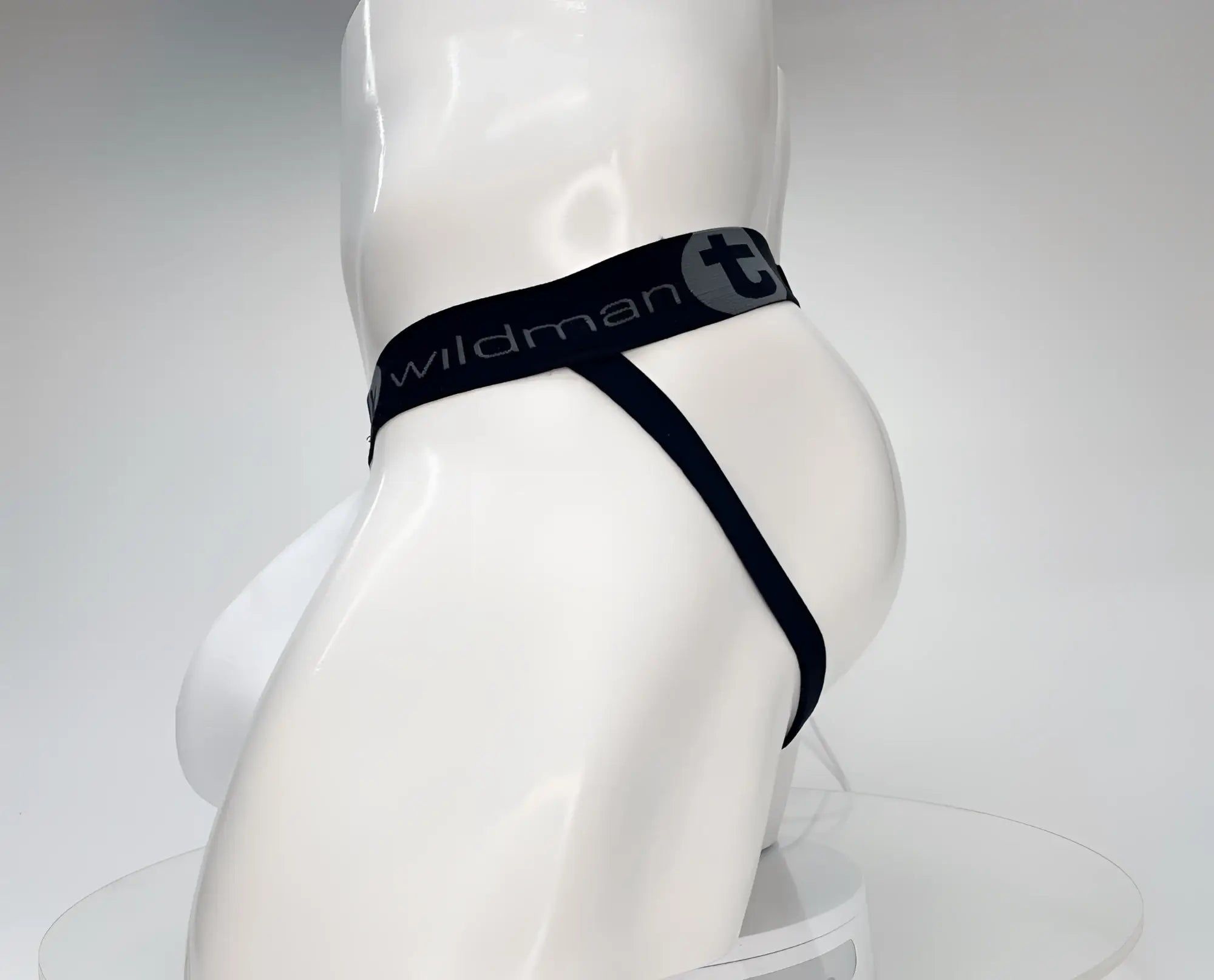 Black wildman brand cotton monster cock jockstrap thong with sleek minimalist design and elastic waistband white color