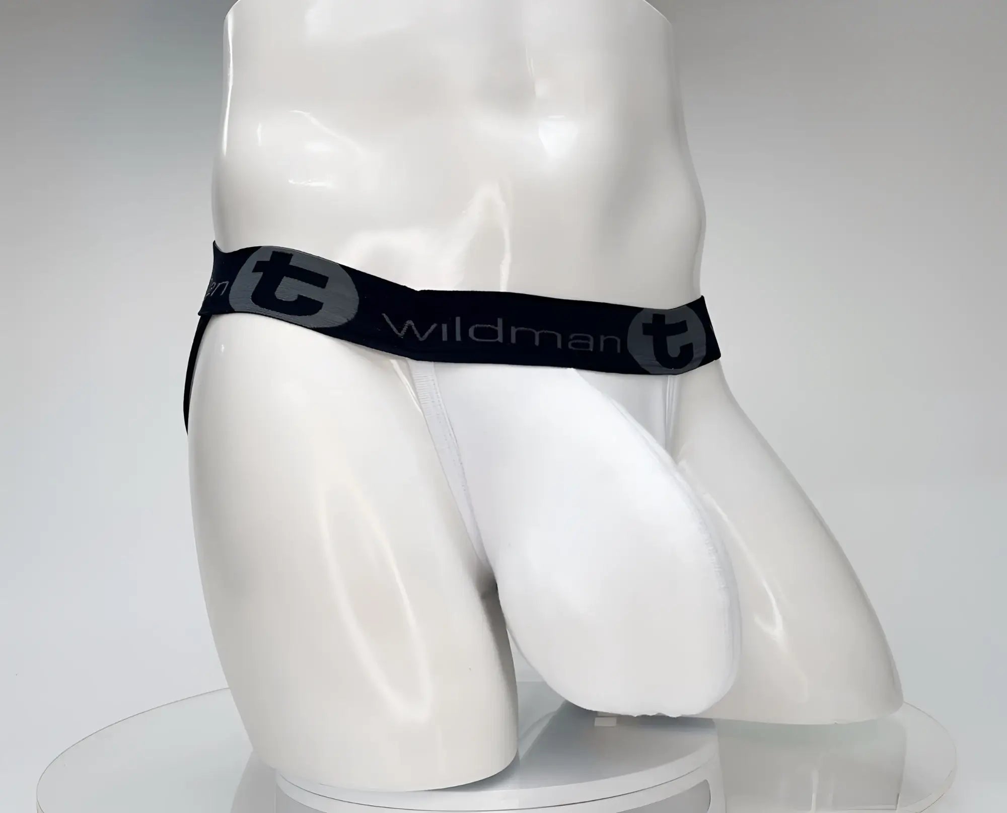 White wildman cotton monster cock jockstrap briefs with black elastic waistband featuring t logo and gray lettering