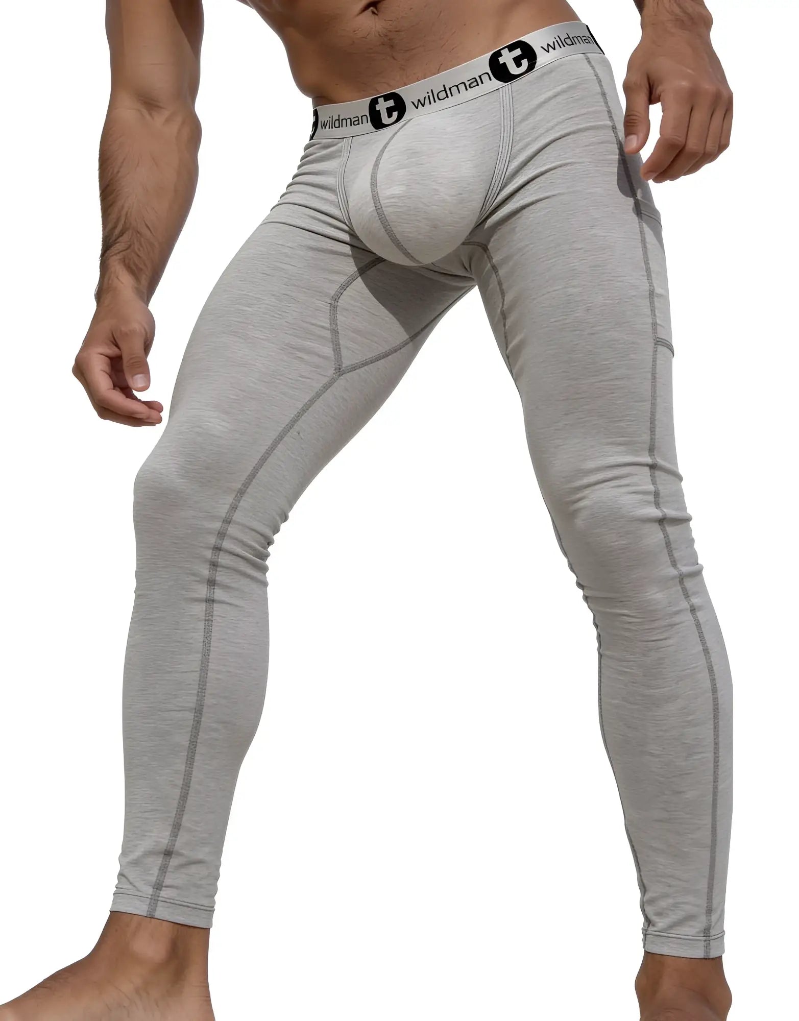 Gray form-fitting men’s cotton compression tights with a white wildman logo waistband for long johns underwear