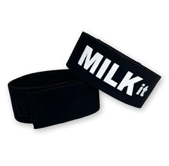 Black elastic wristband cock-ring with bold white milk it logo designed by wildmant for fetish use