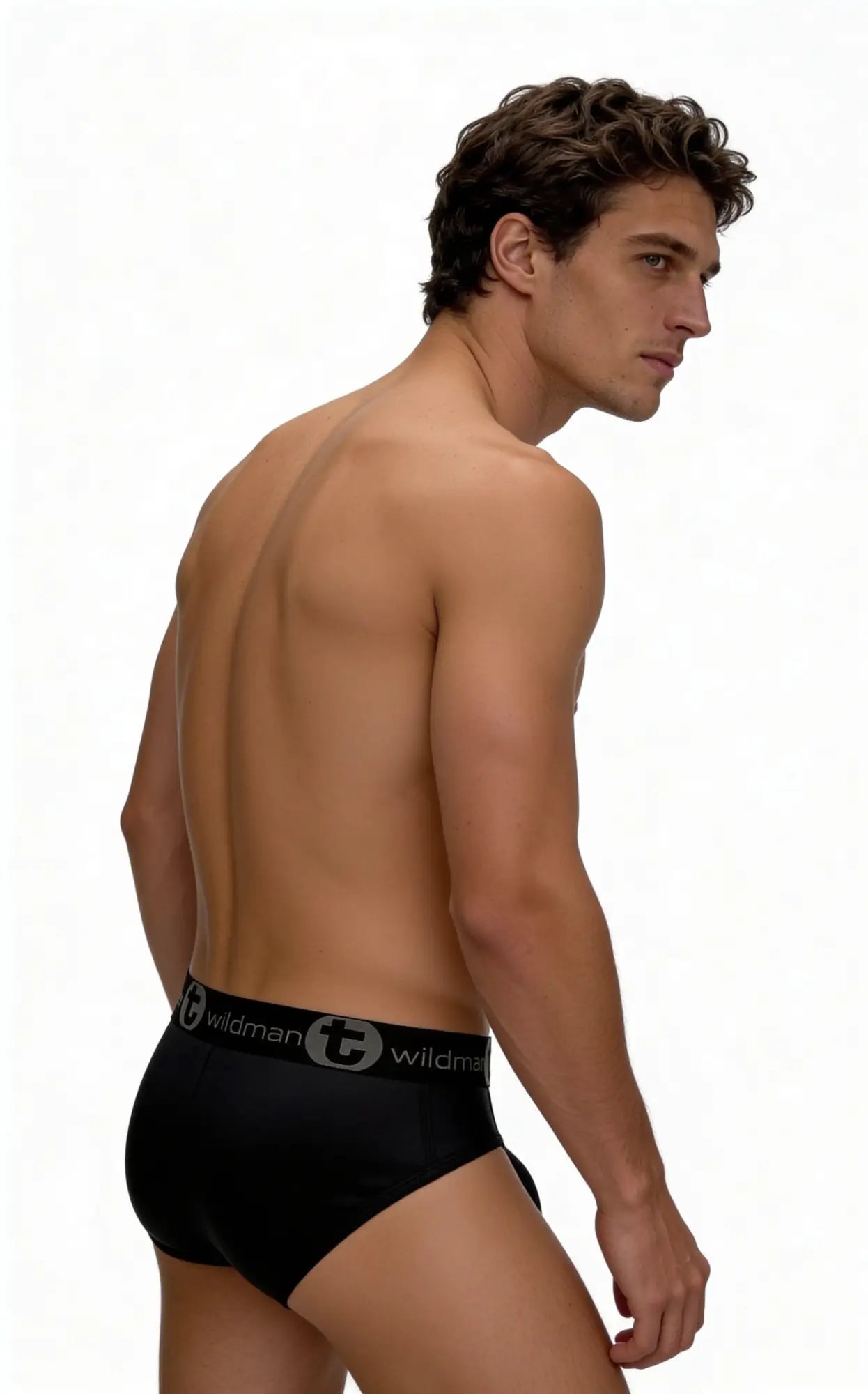 Black mesh briefs with gray elastic waistband featuring wildman logo and lettering in the mesh monster cock brief