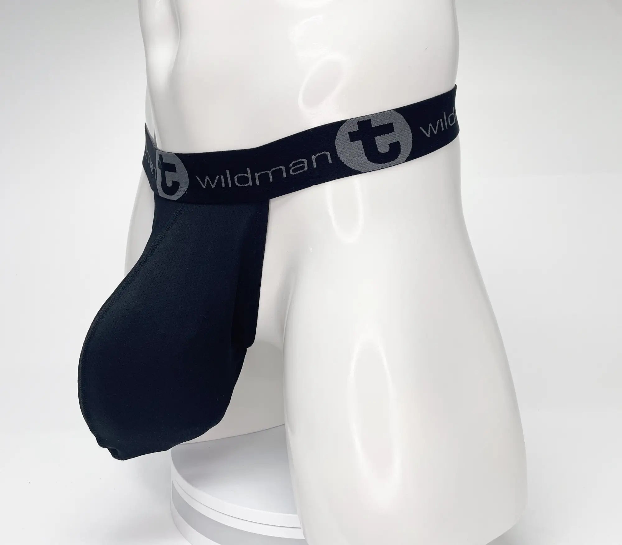 Navy blue Wildman brand mesh jockstrap with elastic waistband and logo detailing in a strapless pouch design