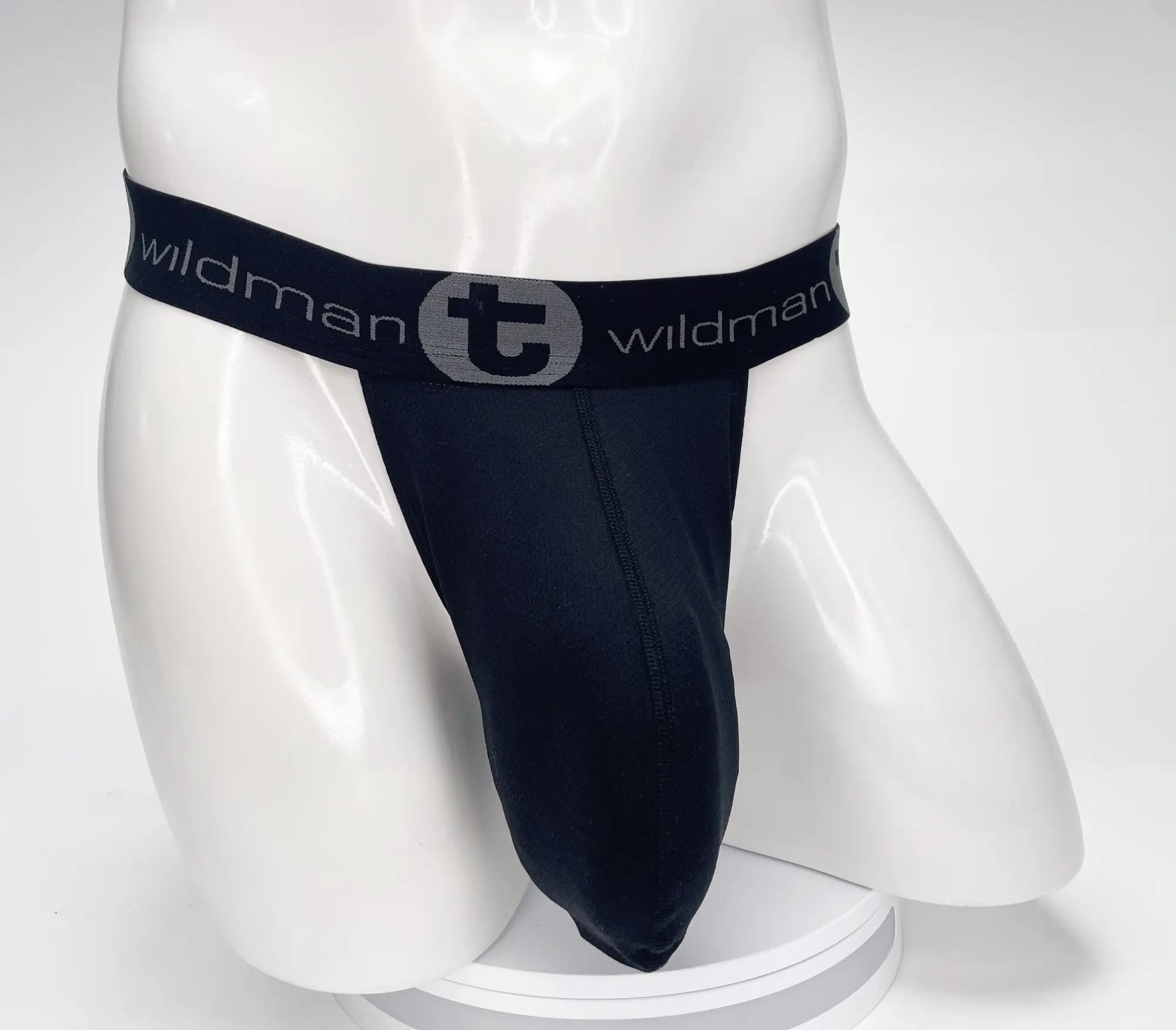 Black wildman mesh monster cock strapless pouch jockstrap in black with sleek elastic waistband and gray wildman logo