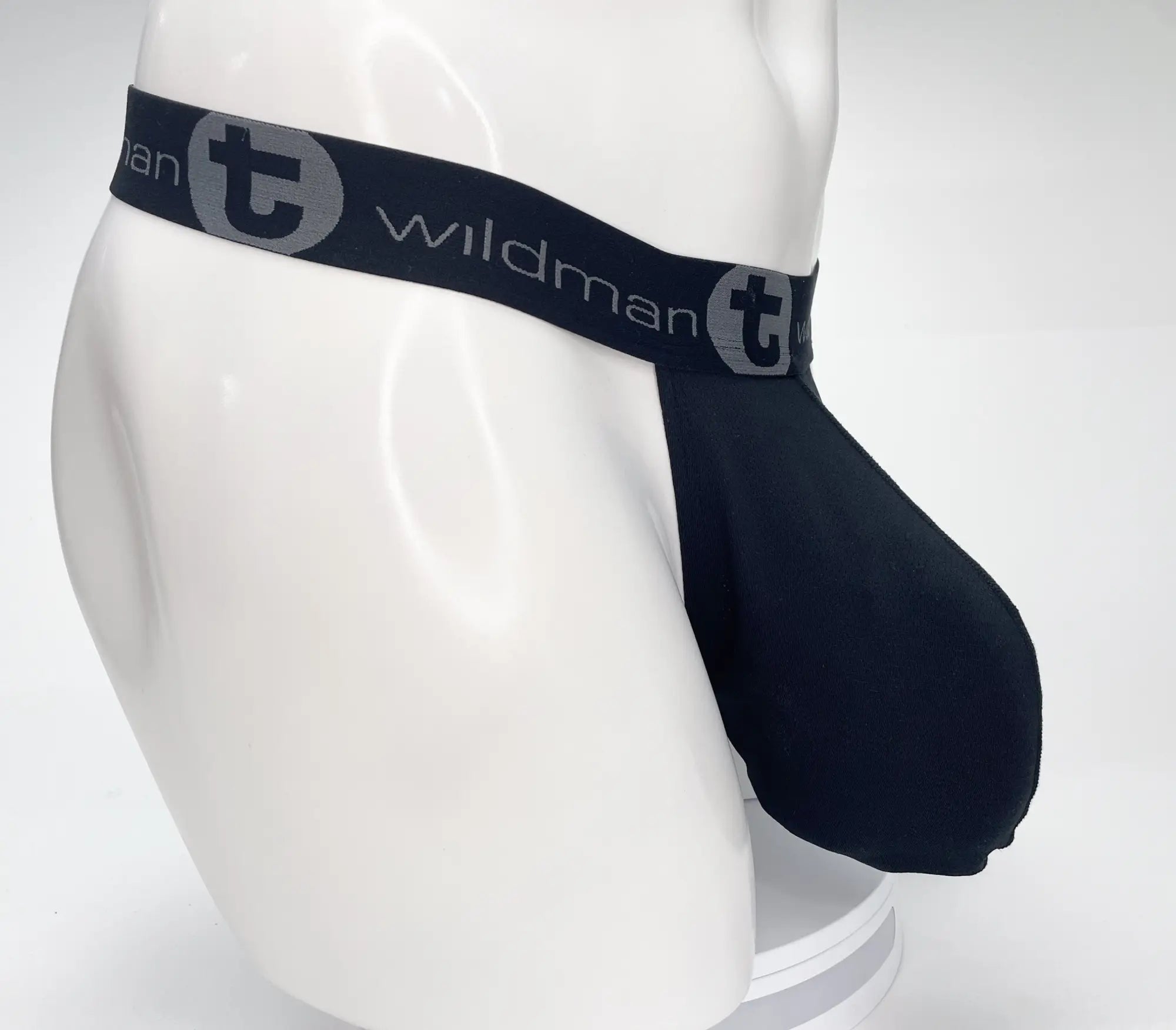 Black wildman brand men’s briefs with a gray logo band featuring a strapless pouch in breathable mesh material
