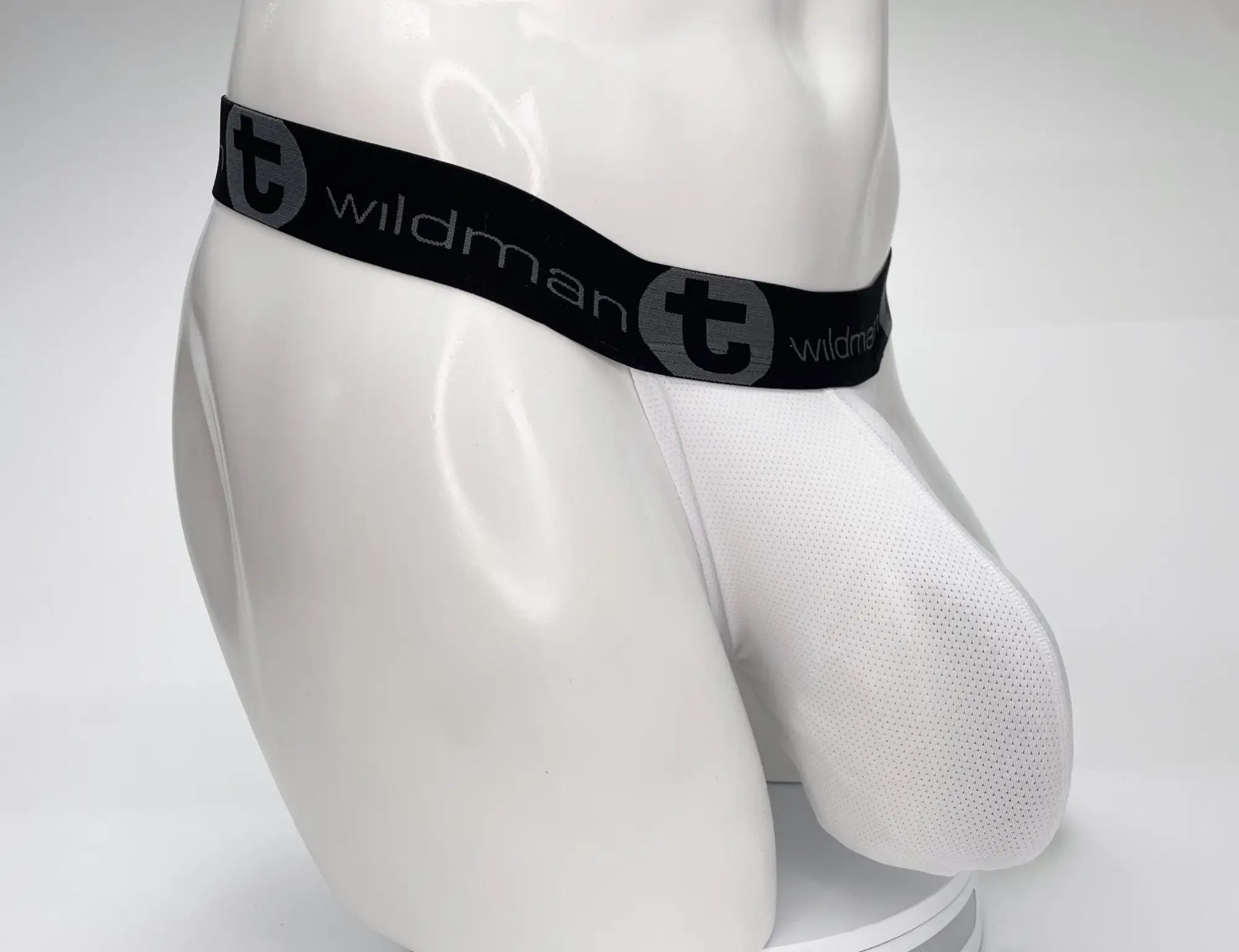WildmanT mesh monster cock strapless pouch white briefs with white mesh and black elastic waistband featuring wildman logo