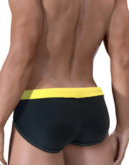 Black WildmanT Moby big boy pouch swim trunks with bright yellow waistband for comfortable beachwear