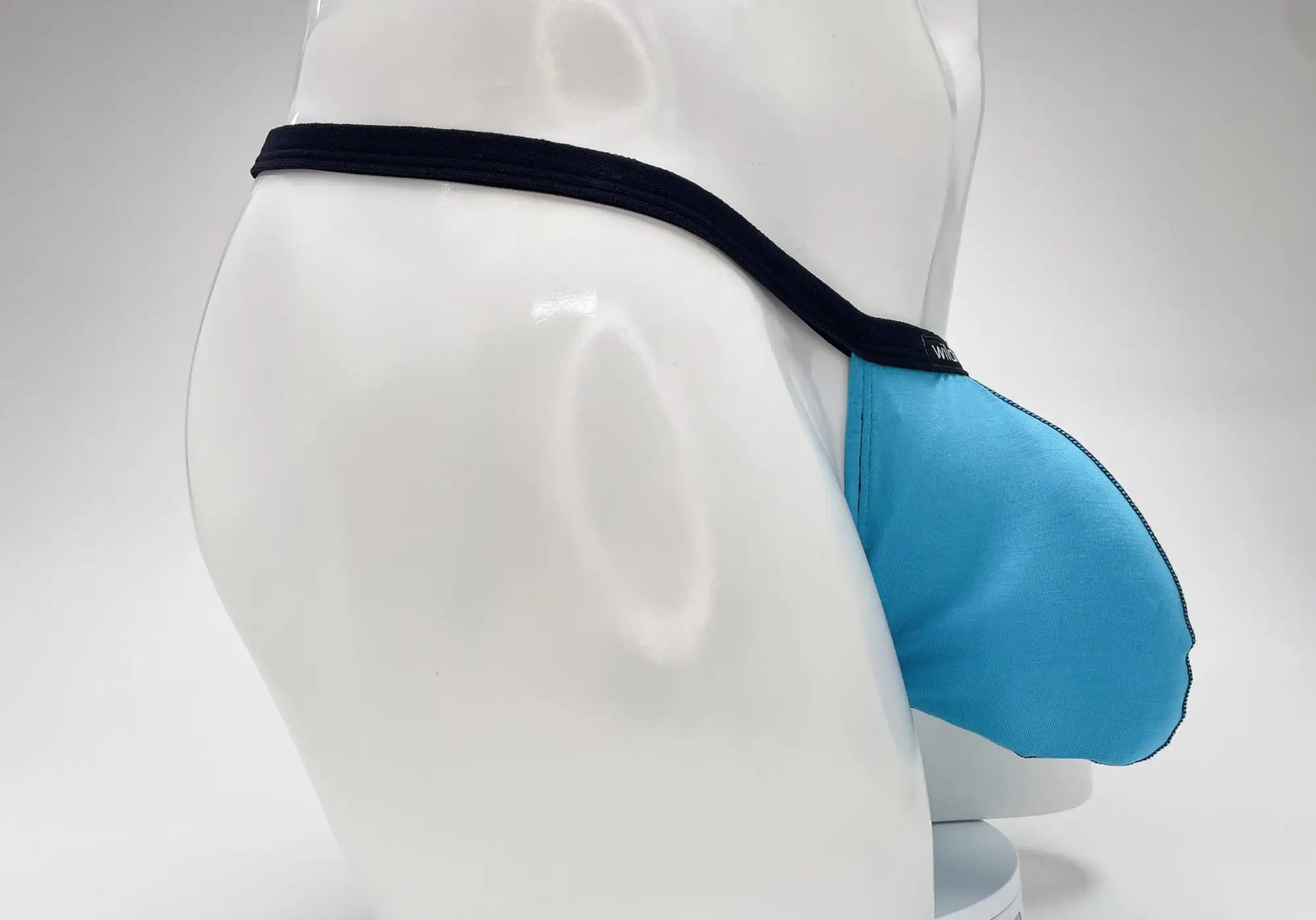 Wildmant modal micro thong big boy pouch baby blue in blue with black elastic waistband made of modal fabric