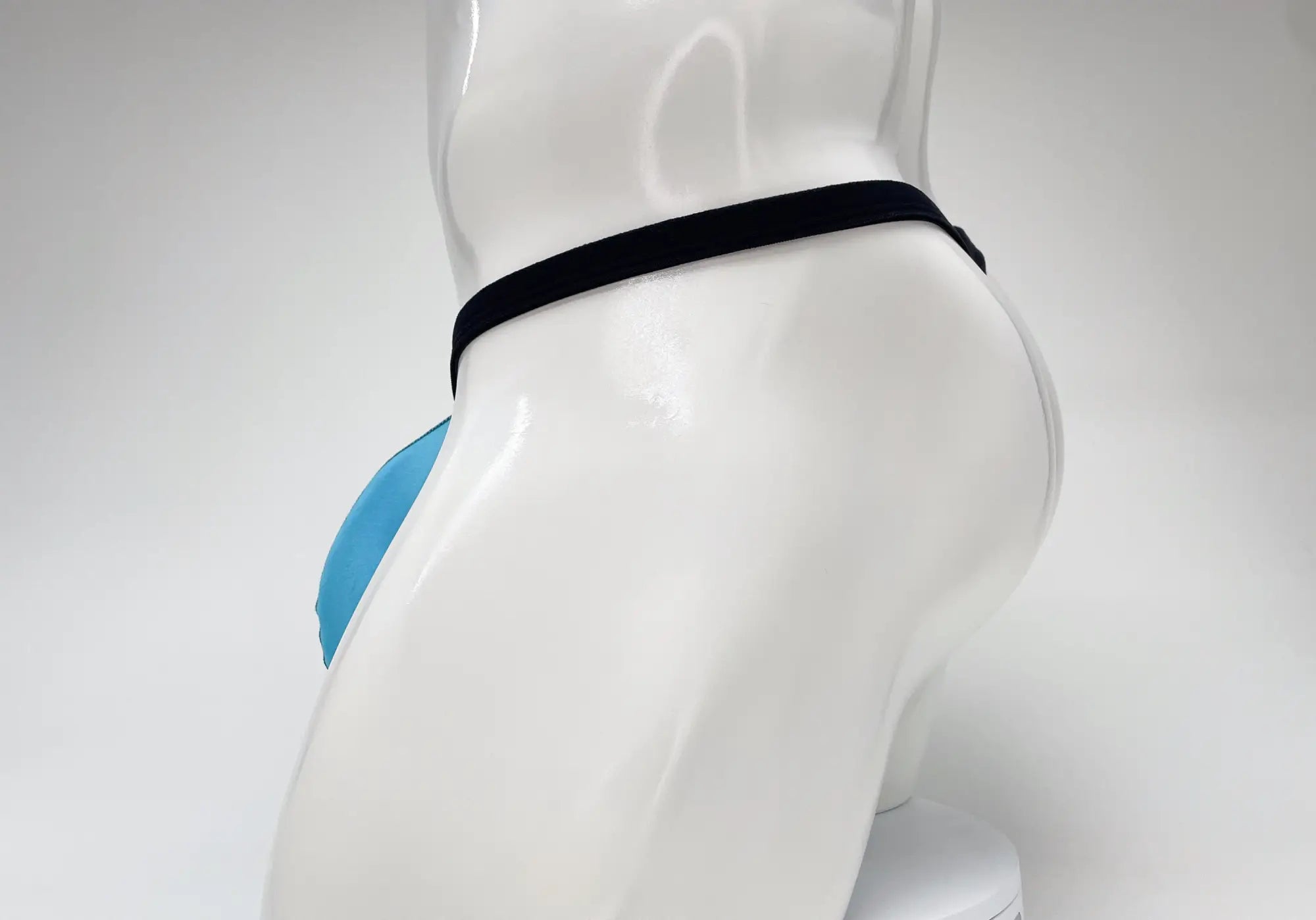Wildmant modal micro thong big boy pouch in blue and black with sleek form-fitting athletic design