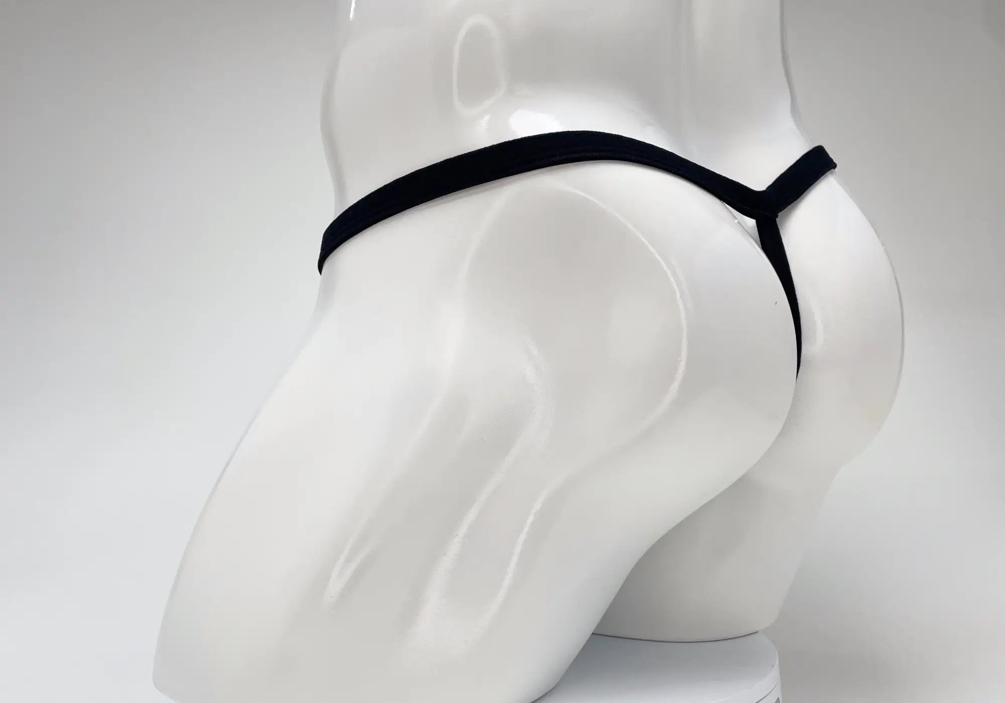 Black thong with sleek minimalist design made from modal fabric in baby blue for comfortable big boy pouch fit