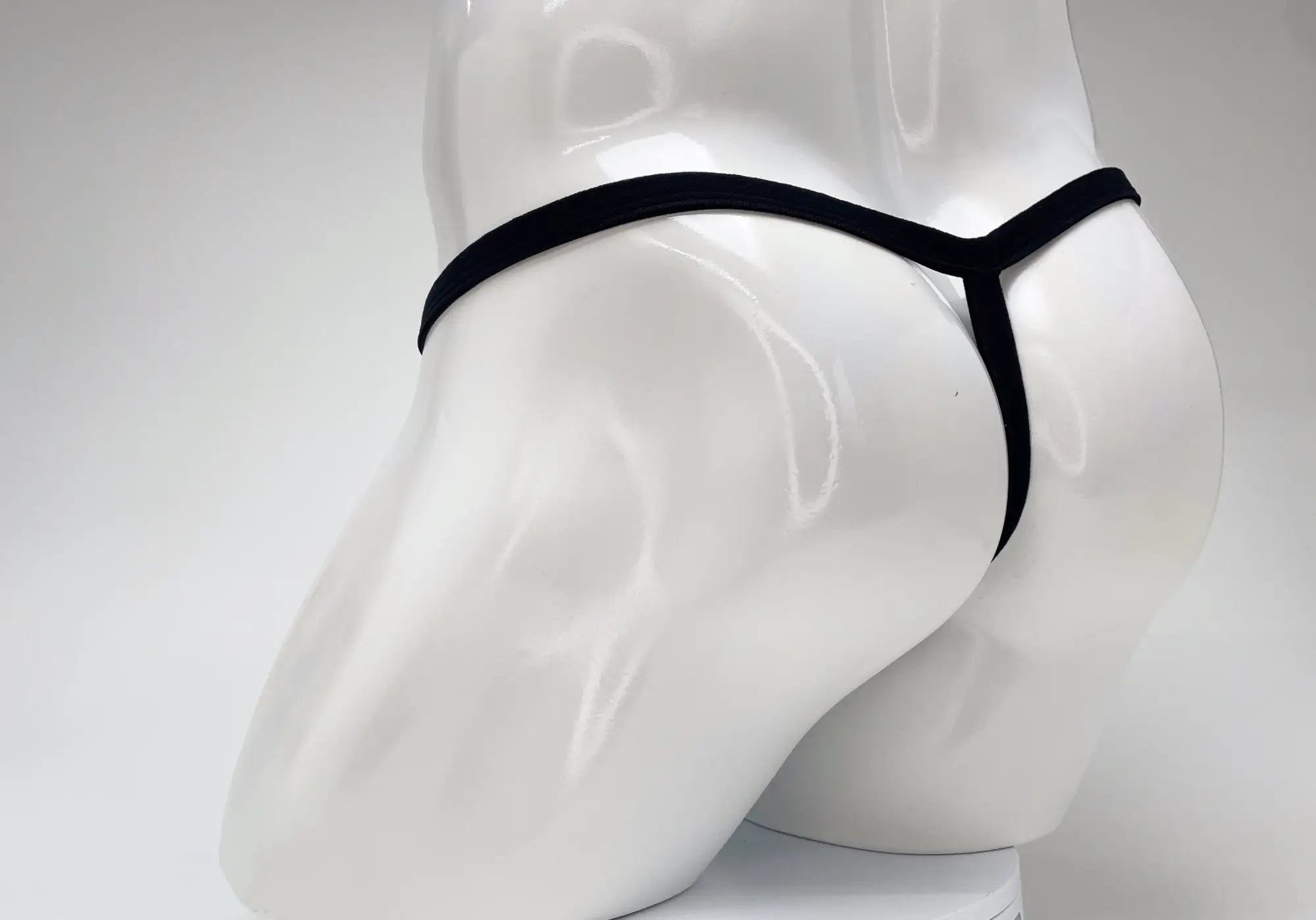 Black WildmanT modal micro thong with big boy pouch in baby blue featuring a sleek minimalist design