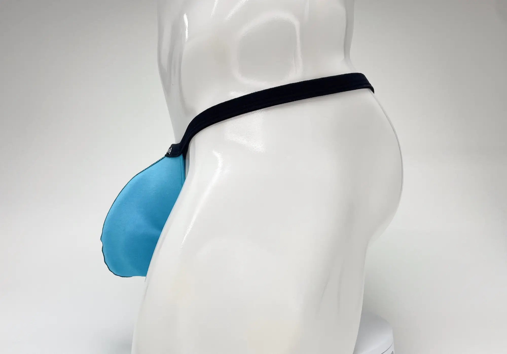 Wildmant modal micro thong big boy pouch in baby blue silicone with black elastic strap for comfortable support
