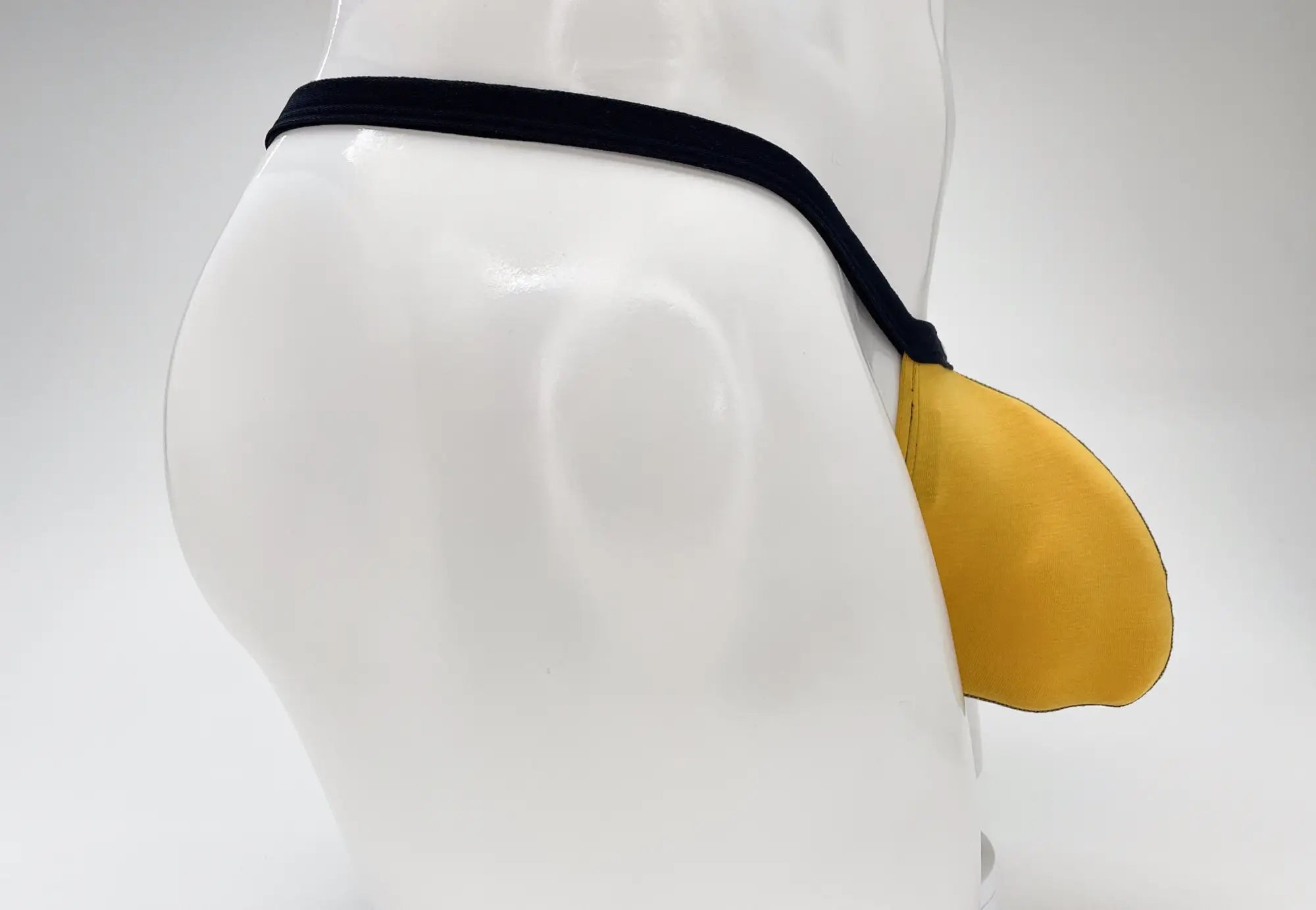 Wildmant modal micro thong big boy pouch in black and yellow with padded curved design for men