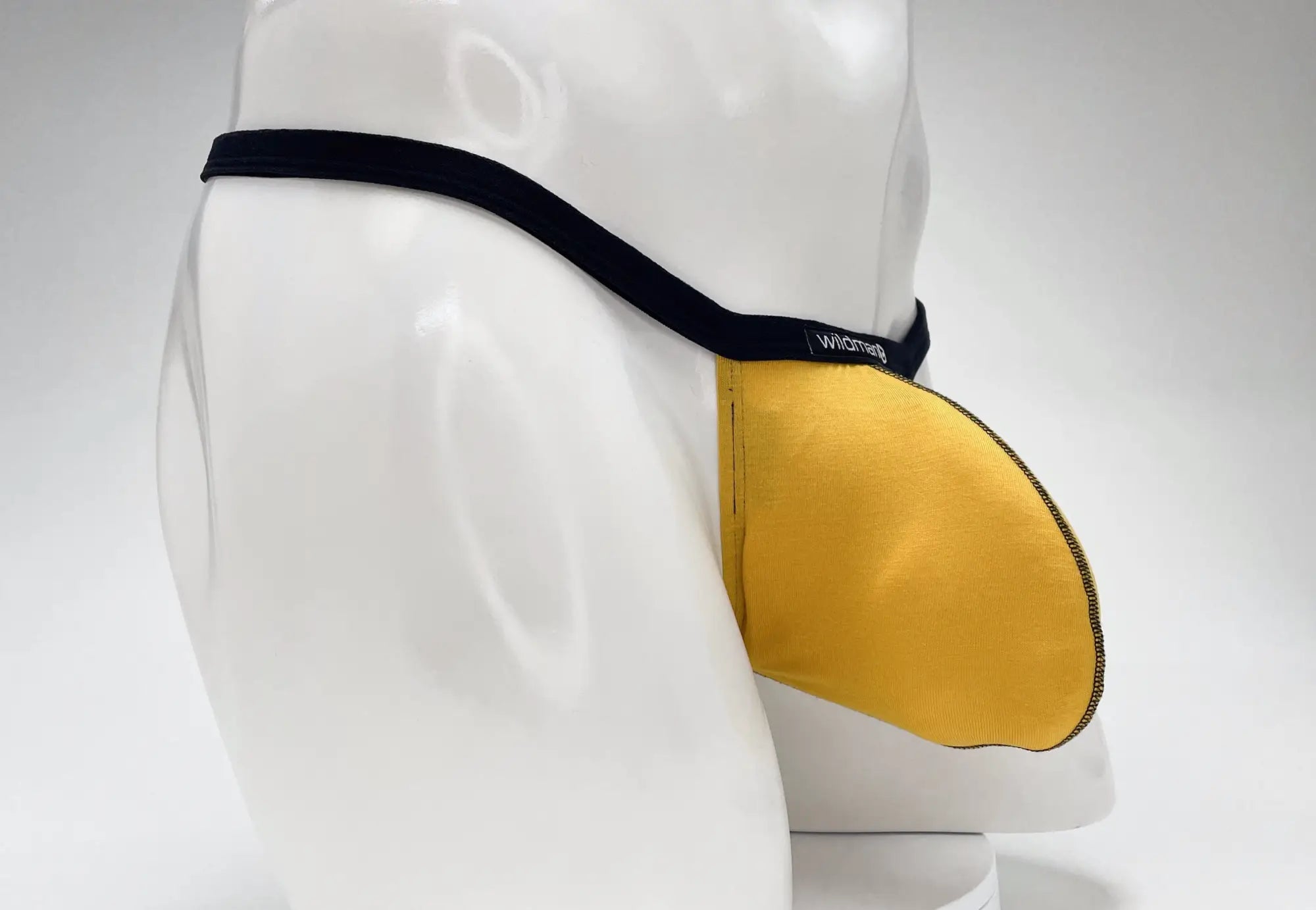Yellow wildthing fabric pouch with black elastic strap designed for wildmant modal micro thong big boy pouch gold