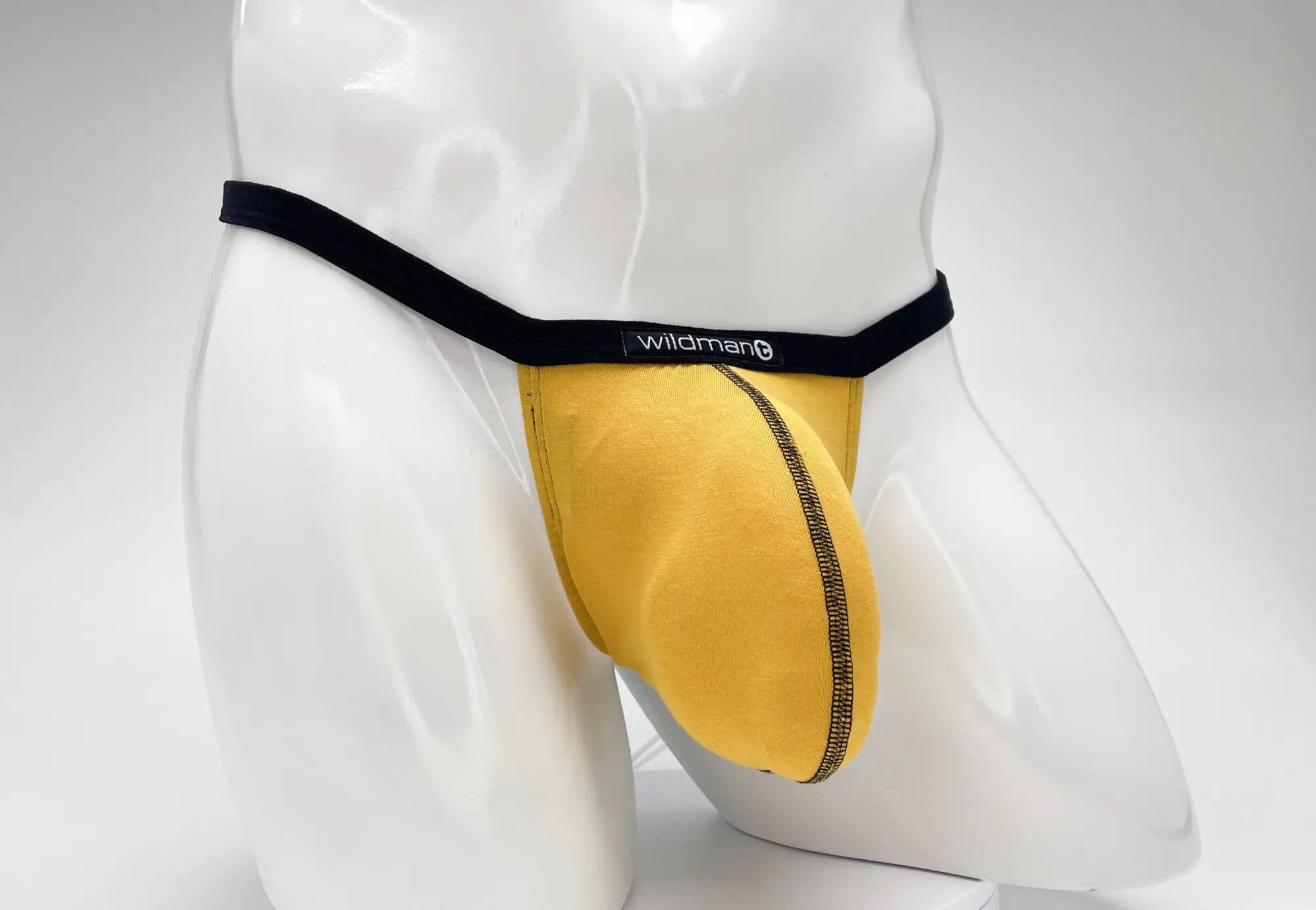 Yellow wildman brief with black waistband and gold-trimmed seam wildmant modal micro thong big boy pouch gold