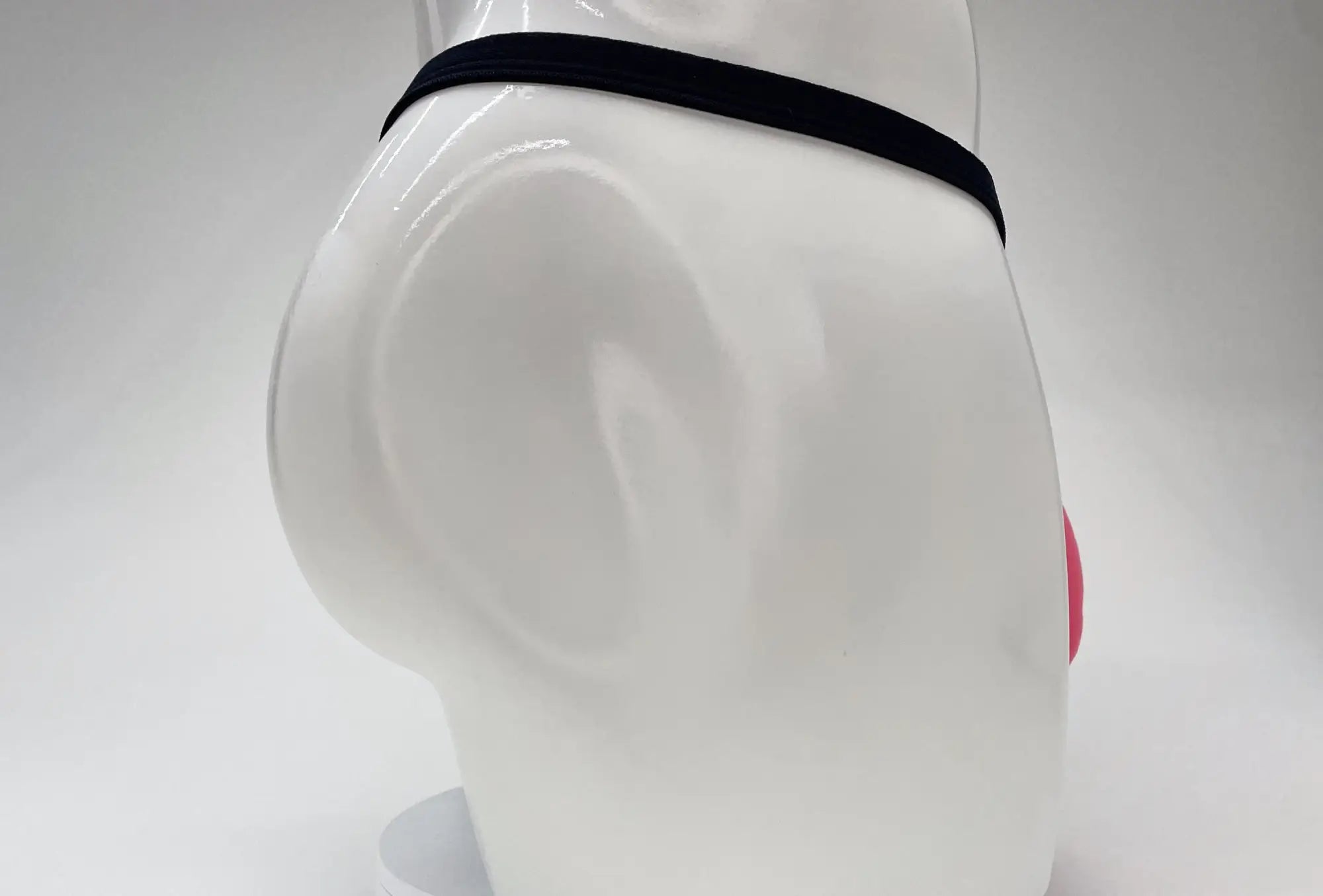 Black elastic waistband with a small pink detail on the side of wildmant modal micro thong big boy pouch pink