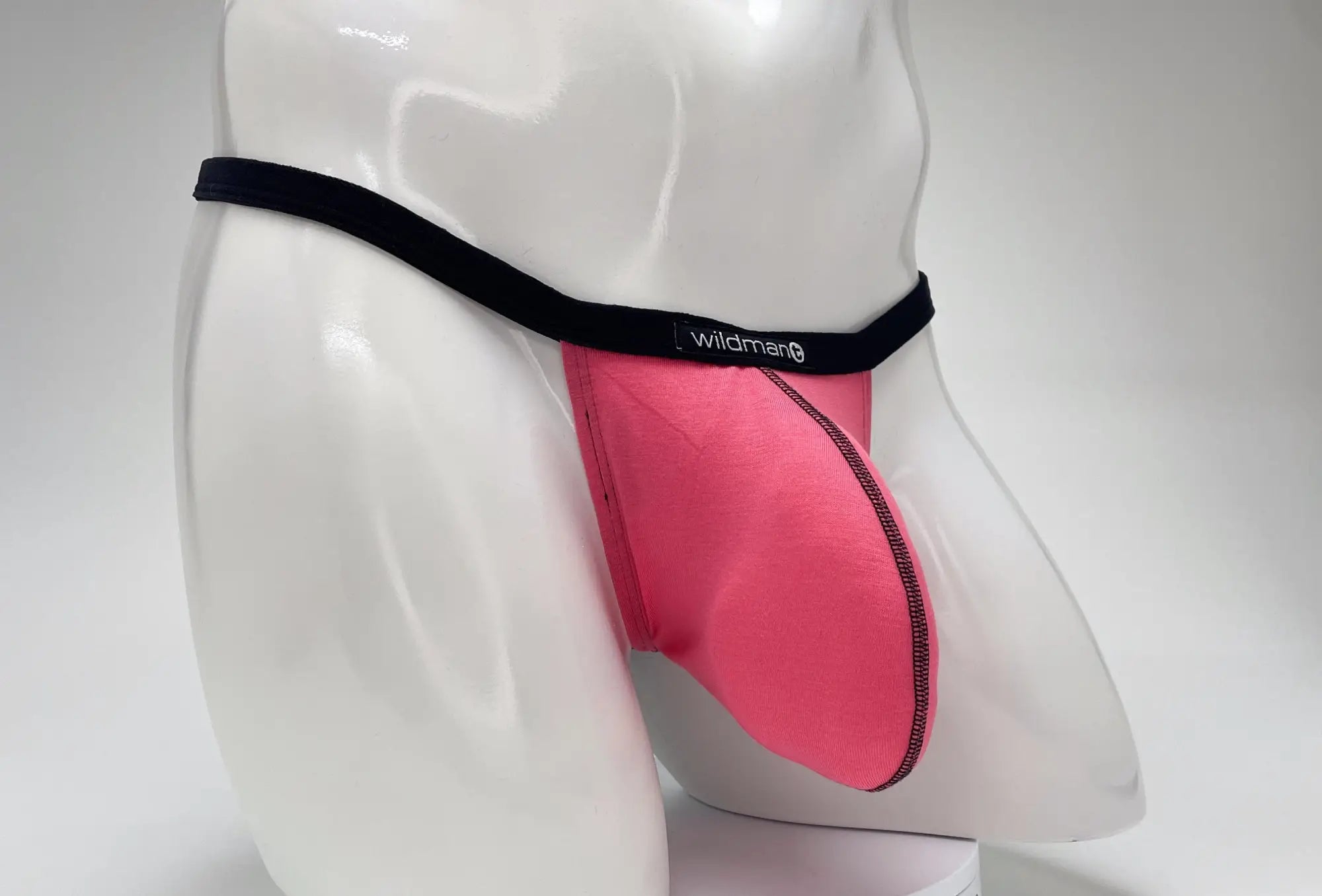 Pink wildman brand briefs with black elastic waistband and stitched seams in wildmant modal micro thong big boy pouch pink