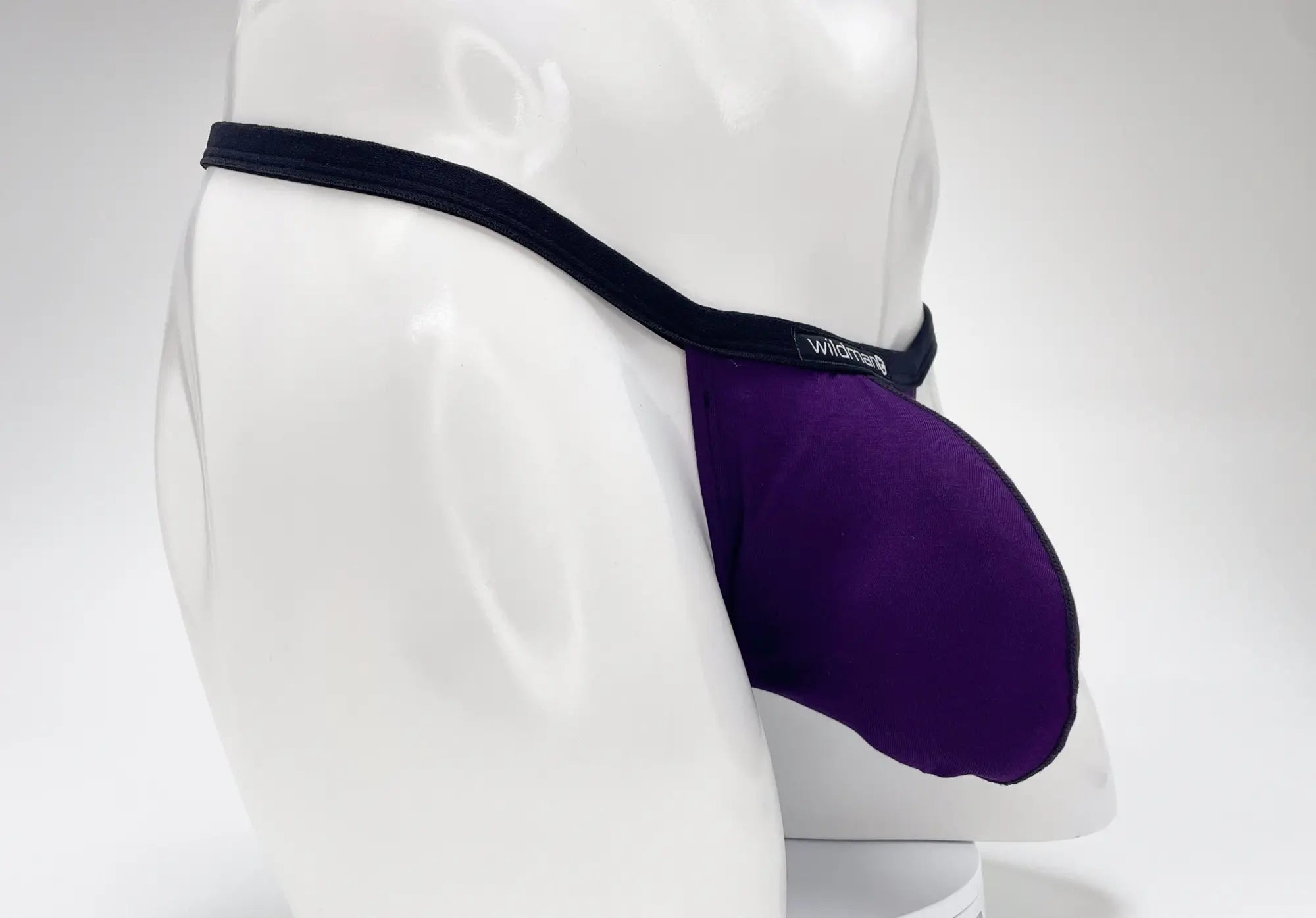 Purple wildmanT modal micro thong jockstrap with black elastic waistband and branded wildtang on the side