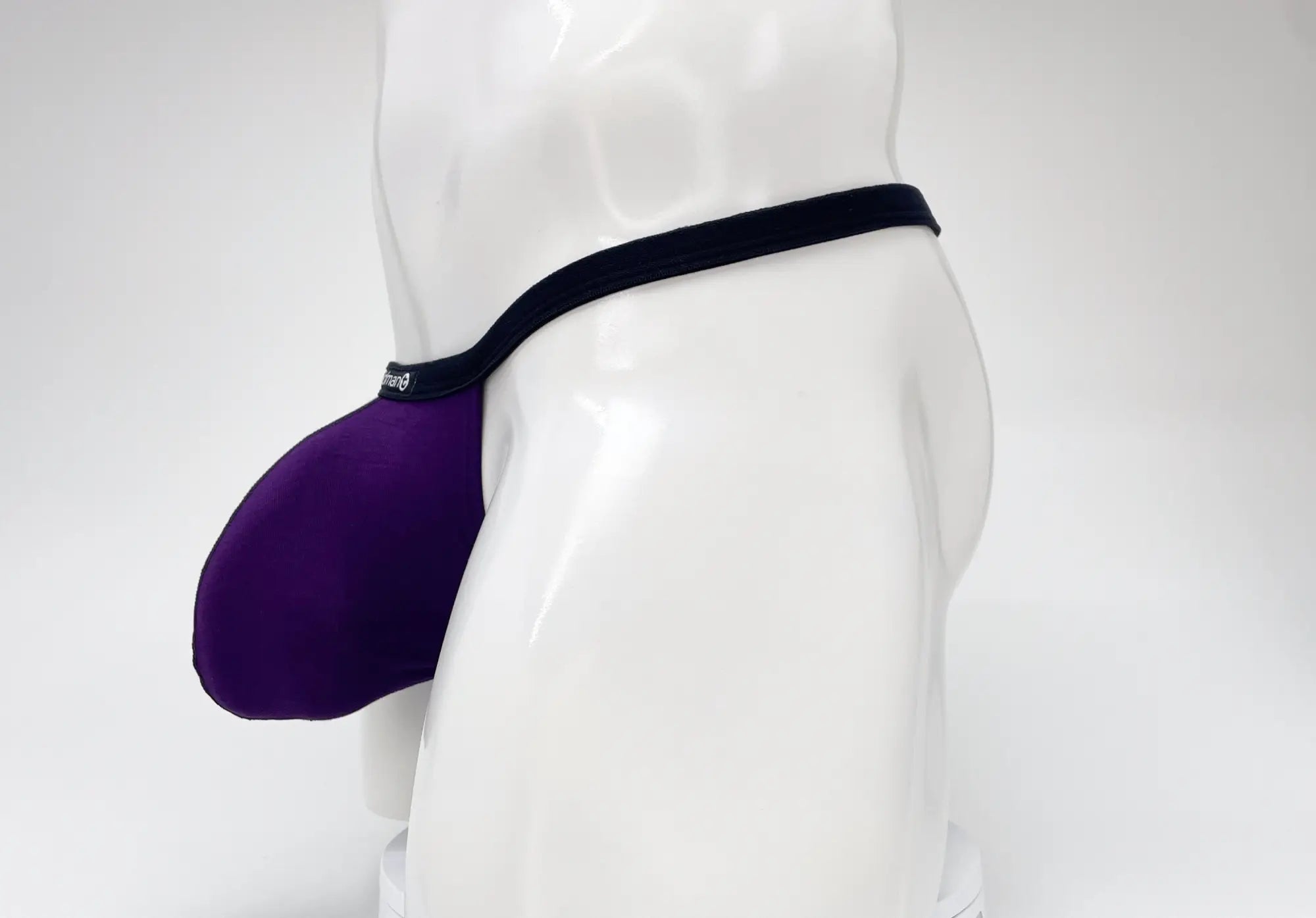 Purple neoprene jockstrap with black elastic waistband from wildmant modal micro thong big boy pouch collection