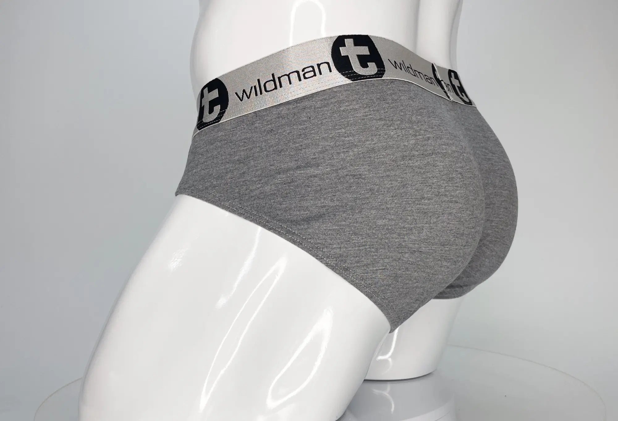 Wildmant modal monster cock brief gray heathered with silver waistband featuring black wildman t logo