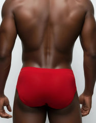 Wildmant monster cock pouch red mesh briefs featuring smooth form-fitting fabric for athletic support