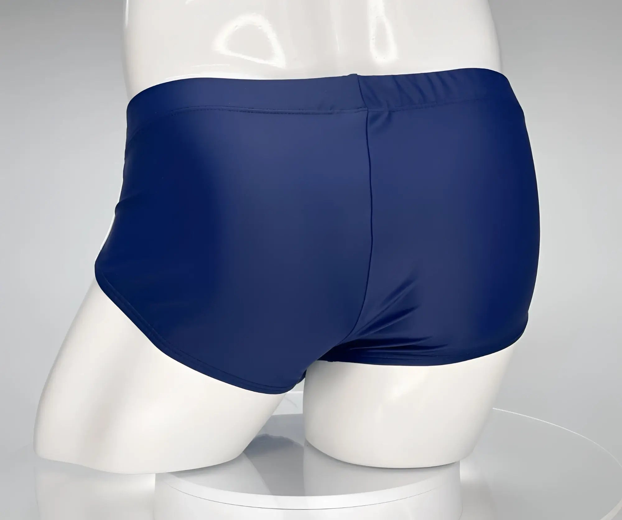 Wildmant monster cock swim brief navy blue swim trunks with smooth stretchy fabric and elastic waistband front view