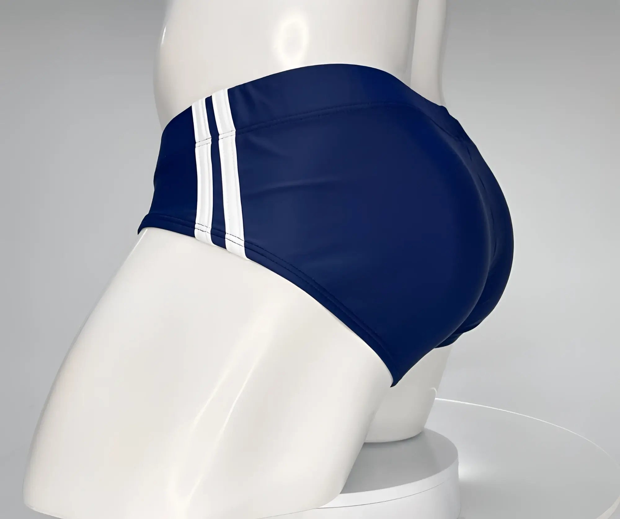 Wildmant monster cock swim brief navy blue swim trunks with two white vertical stripes on the side