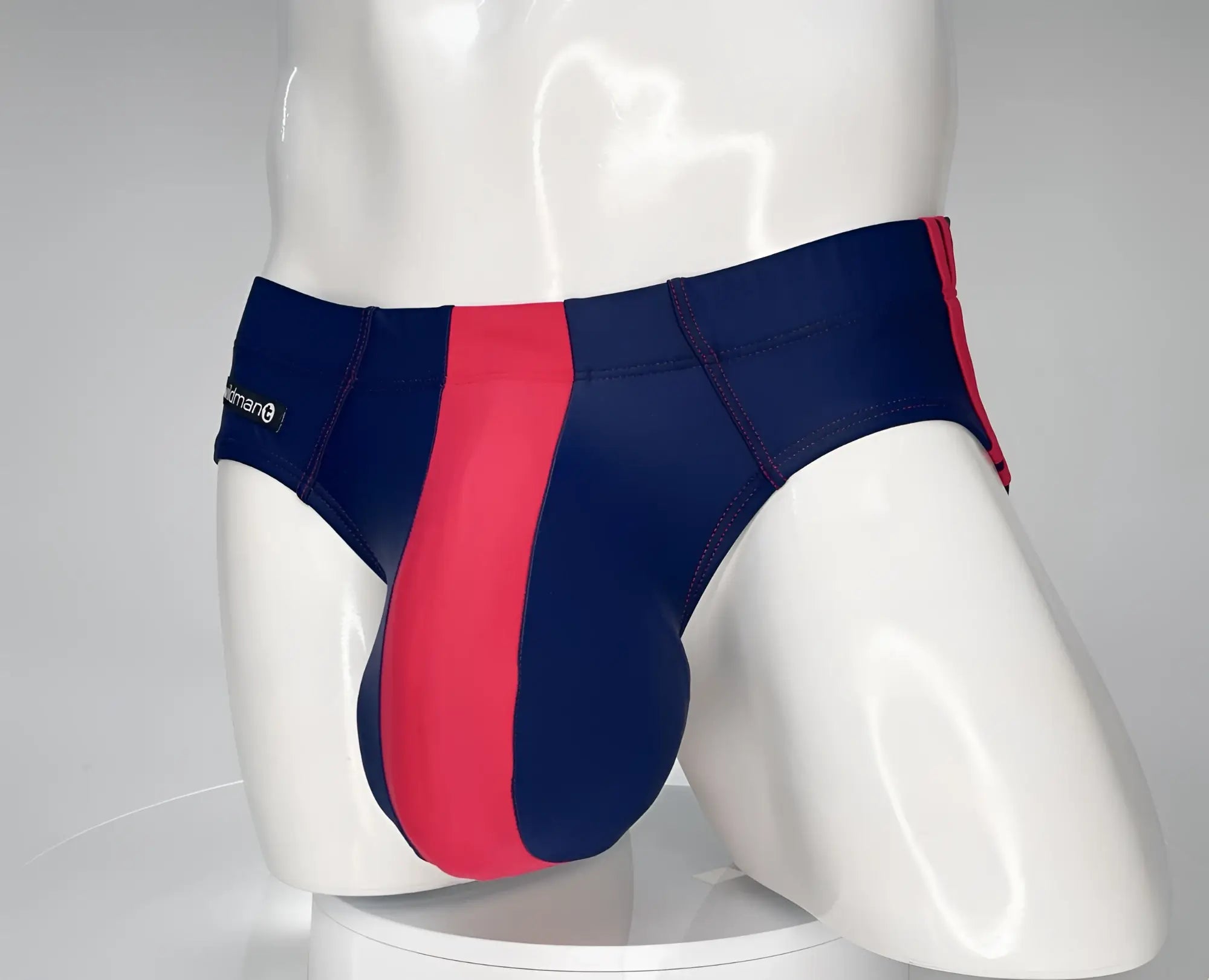 Wildmant monster cock swim brief navy red men’s swim trunks with sleek form-fitting design and navy blue red stripes