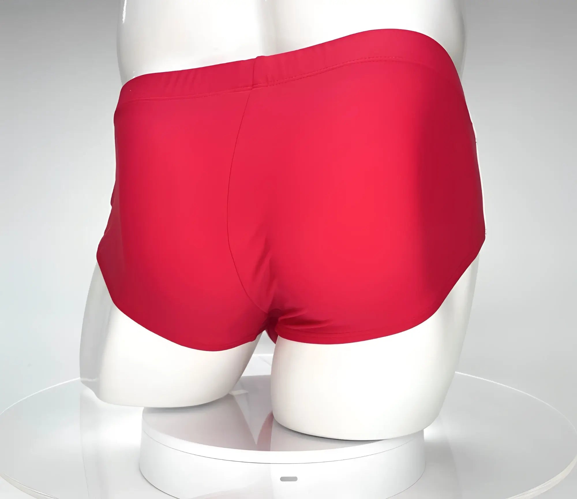 WildmanT Monster Cock swim brief red in bright red smooth stretchy fabric with a simple classic cut