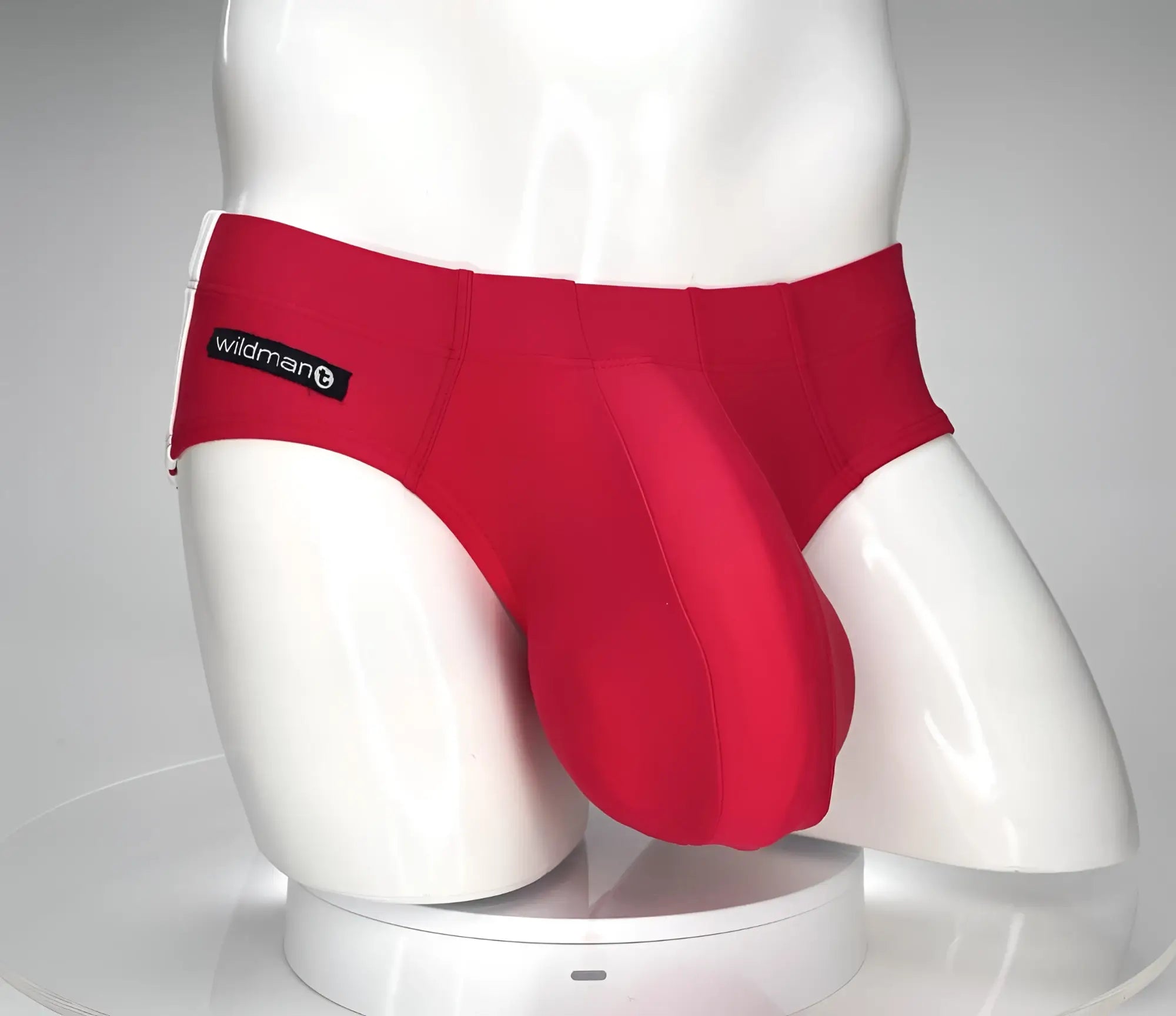 Red wildman monster cock swim brief with supportive contoured design for men in vibrant red color
