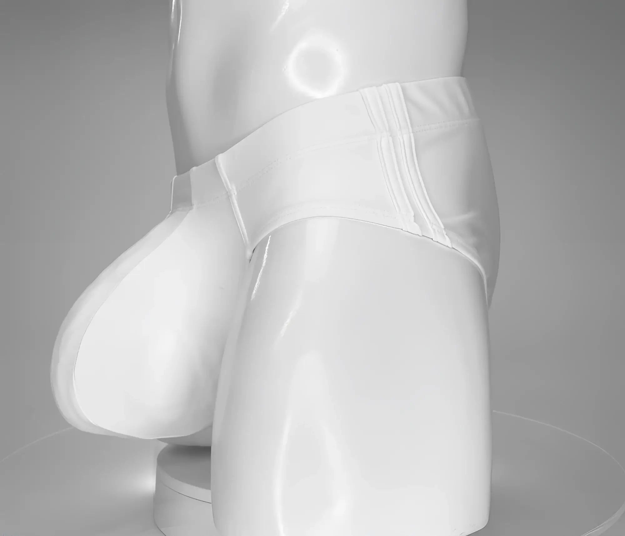 Wildmant monster cock swim brief white glossy latex brief with smooth form fitting design and visible seam detailing