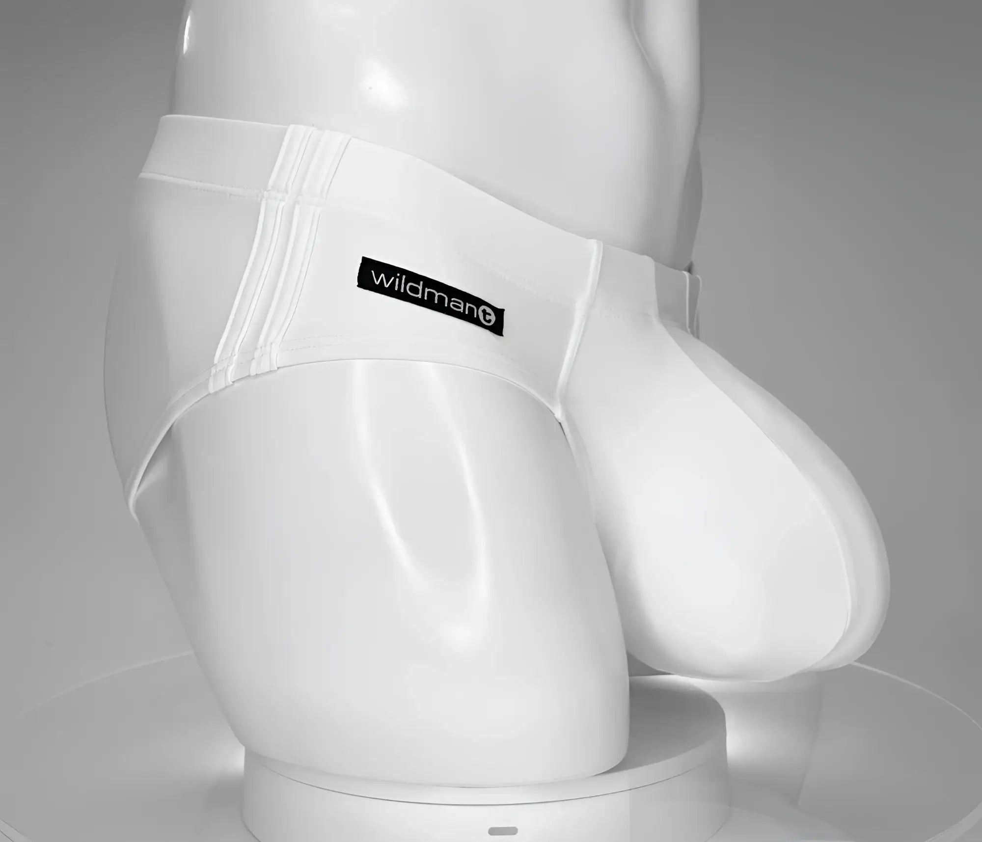 White men’s briefs swim brief with black wildman brand label on waistband designed for comfort and style