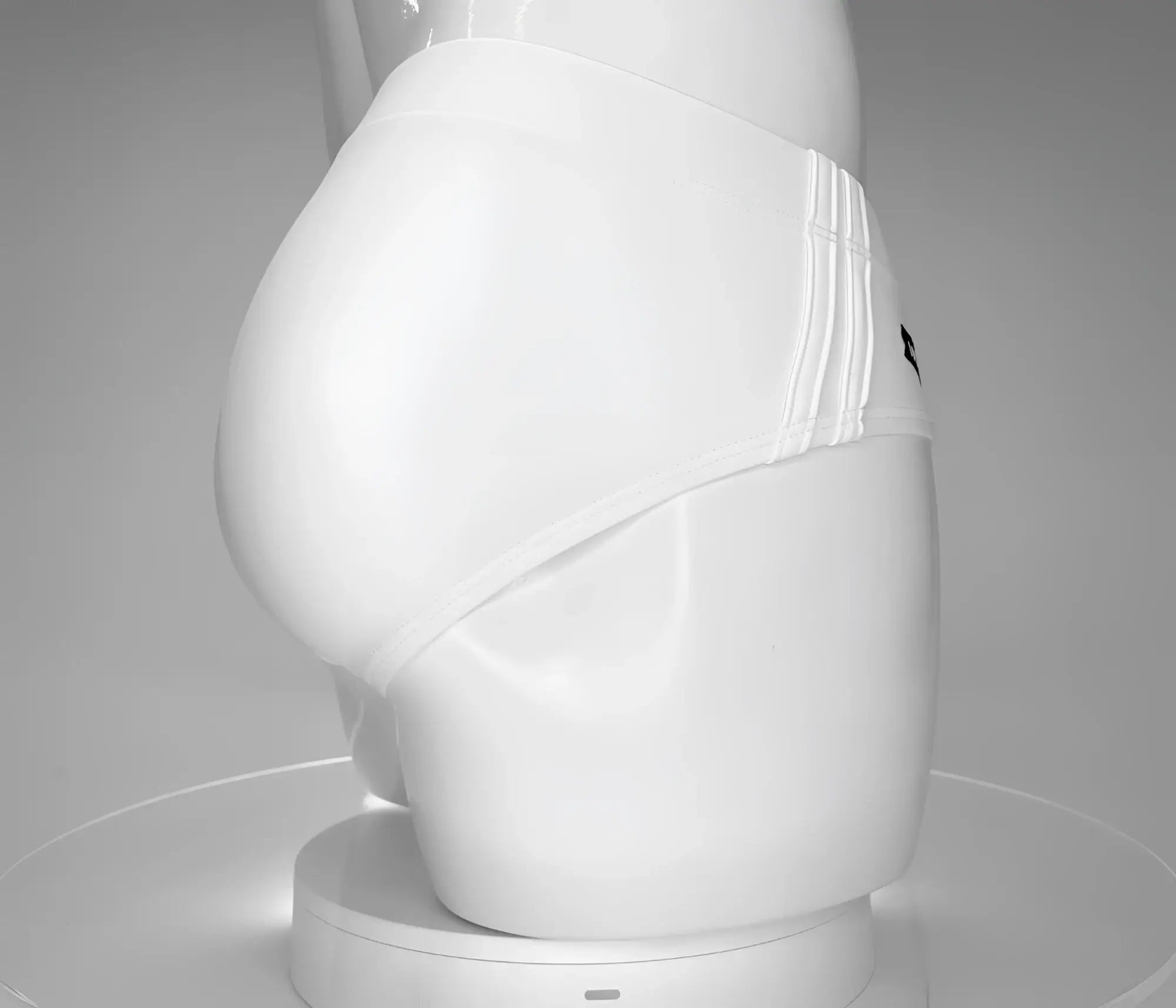 Wildmant monster cock swim brief white with smooth white fabric and subtle vertical stitching on the side seam