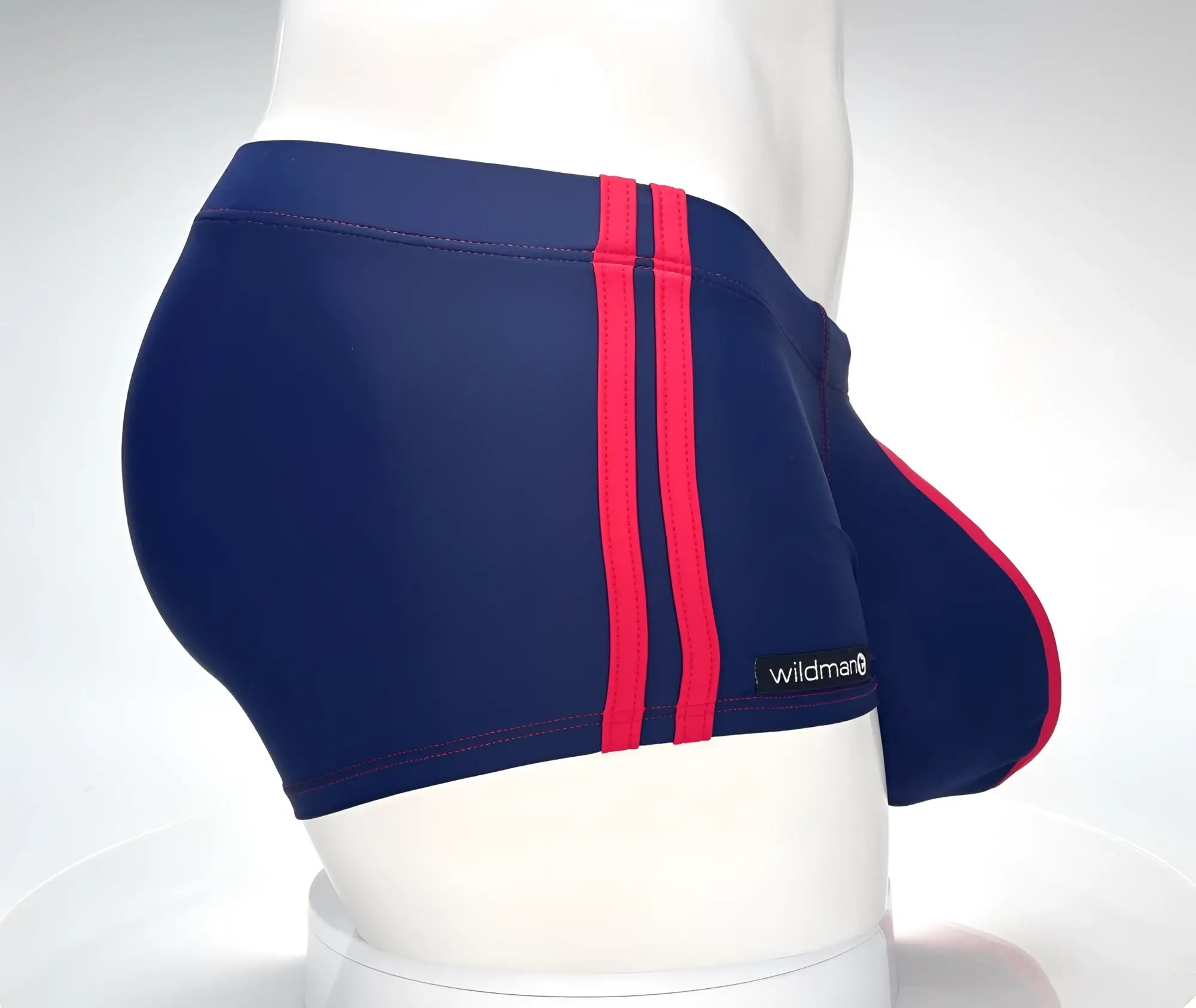 Navy blue wildman swim trunks with bold red stripes and a monster cock square cut design